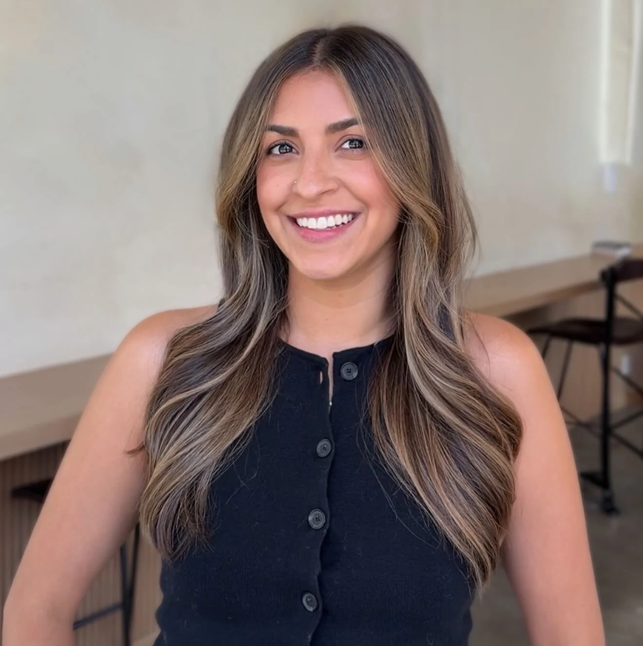 our game plan:

hair color - we started with a great foundation from our previous color appointment but we wanted to bring up her highlights and brighten up the color around her face 

haircut - we cut off some inches, shortened her face framing laye