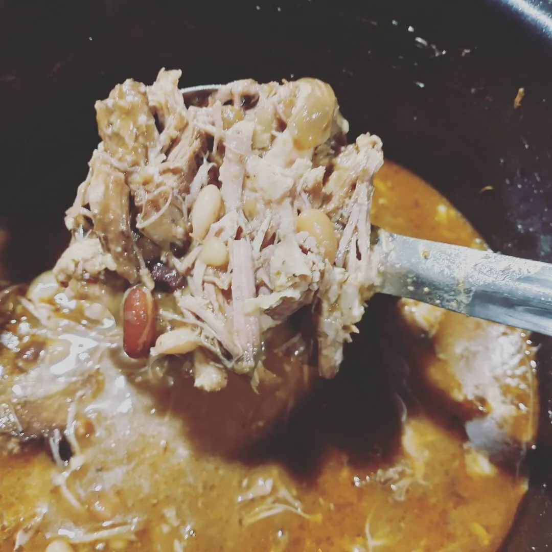 Is there anything more delicious and hearty thank a bean stew on a cold night? 
It is one of my absolute favorite things to cook, because it is the perfect way to use up odds and ends instead of tossing them in the trash. 

I swear this is one of my 