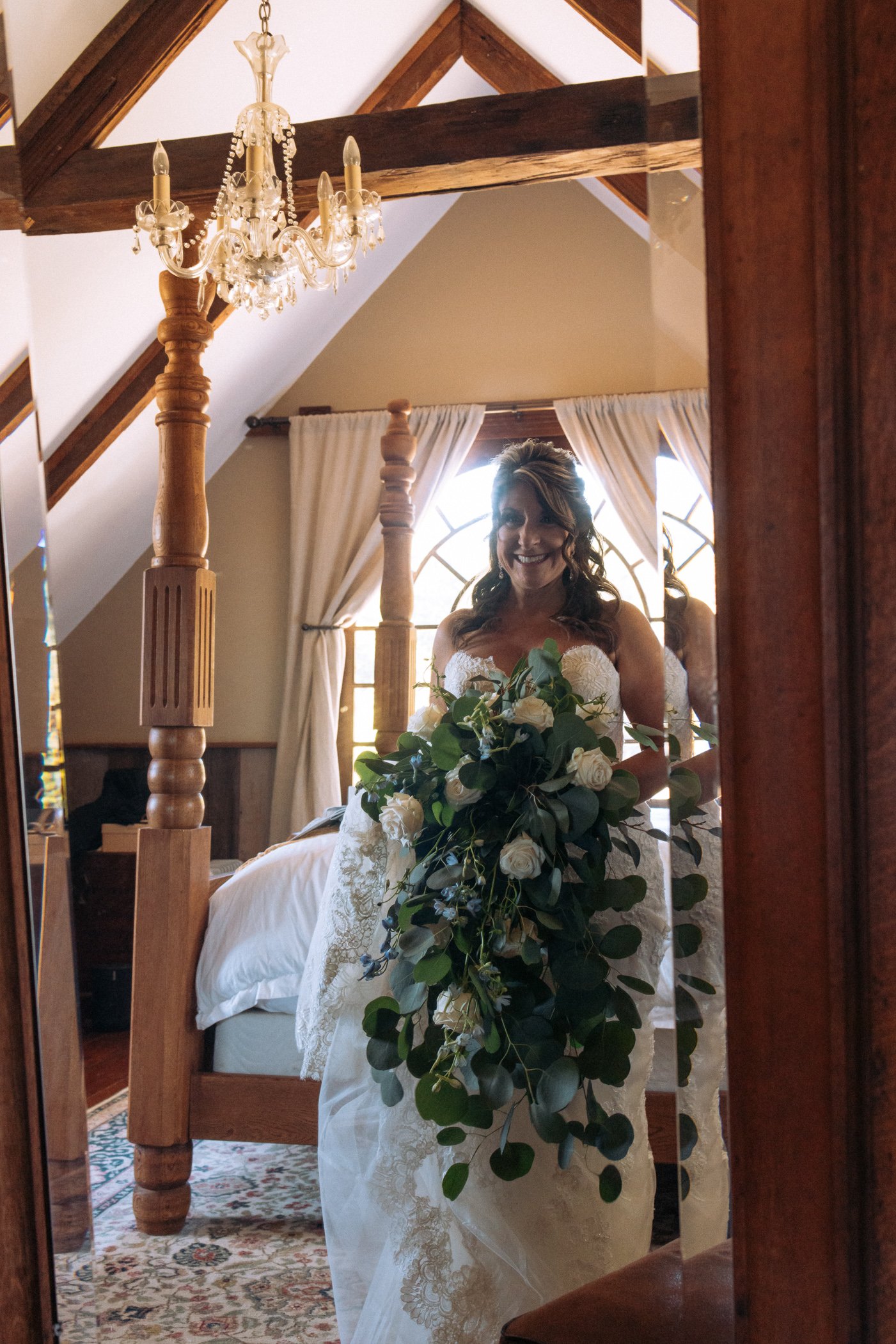 Bride getting ready in front of a mirror at Spring Ranch, in Mendocino, Calfiornia
