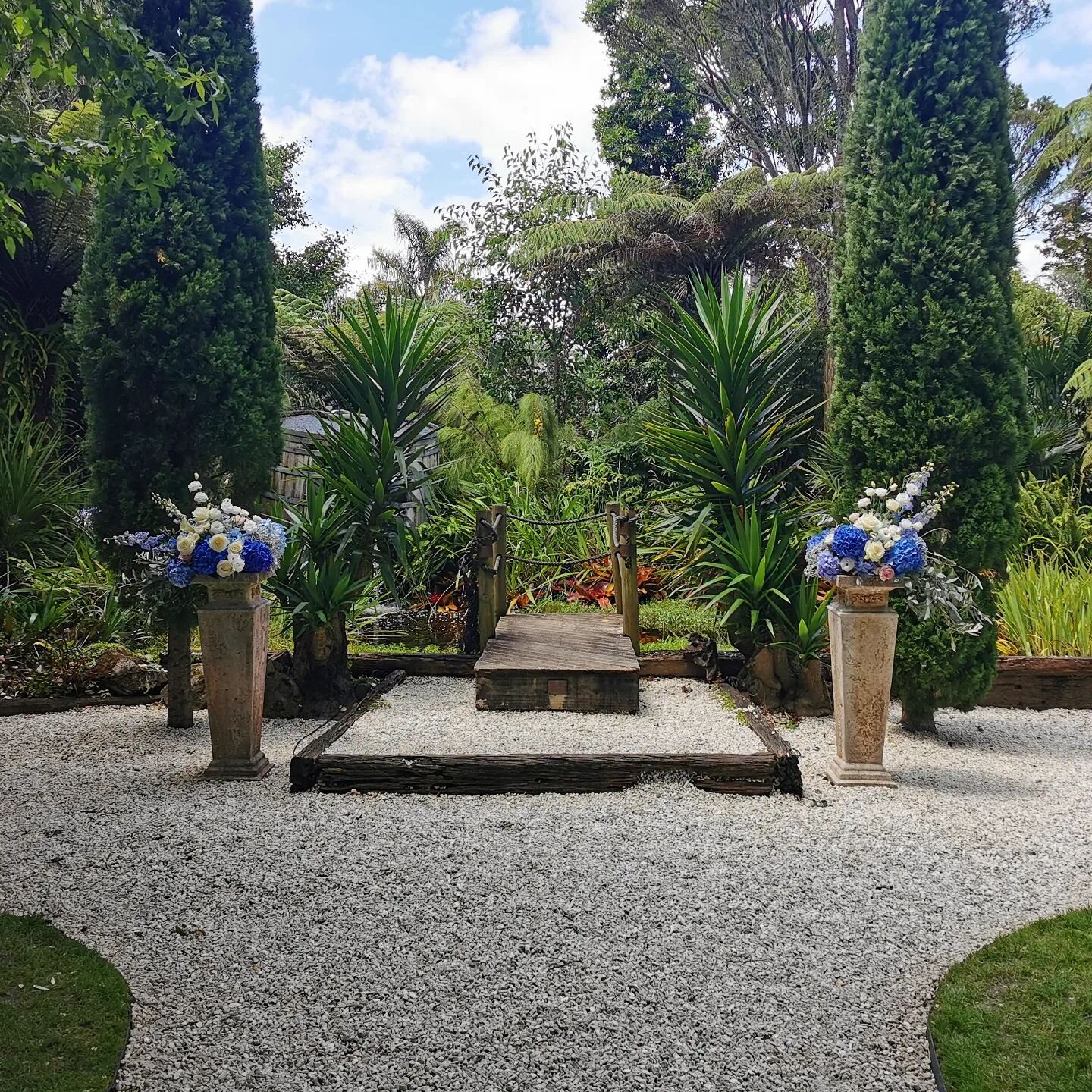 Blue and white pillars for A &amp; R today.

These double as head table arrangements once the ceremony is done.