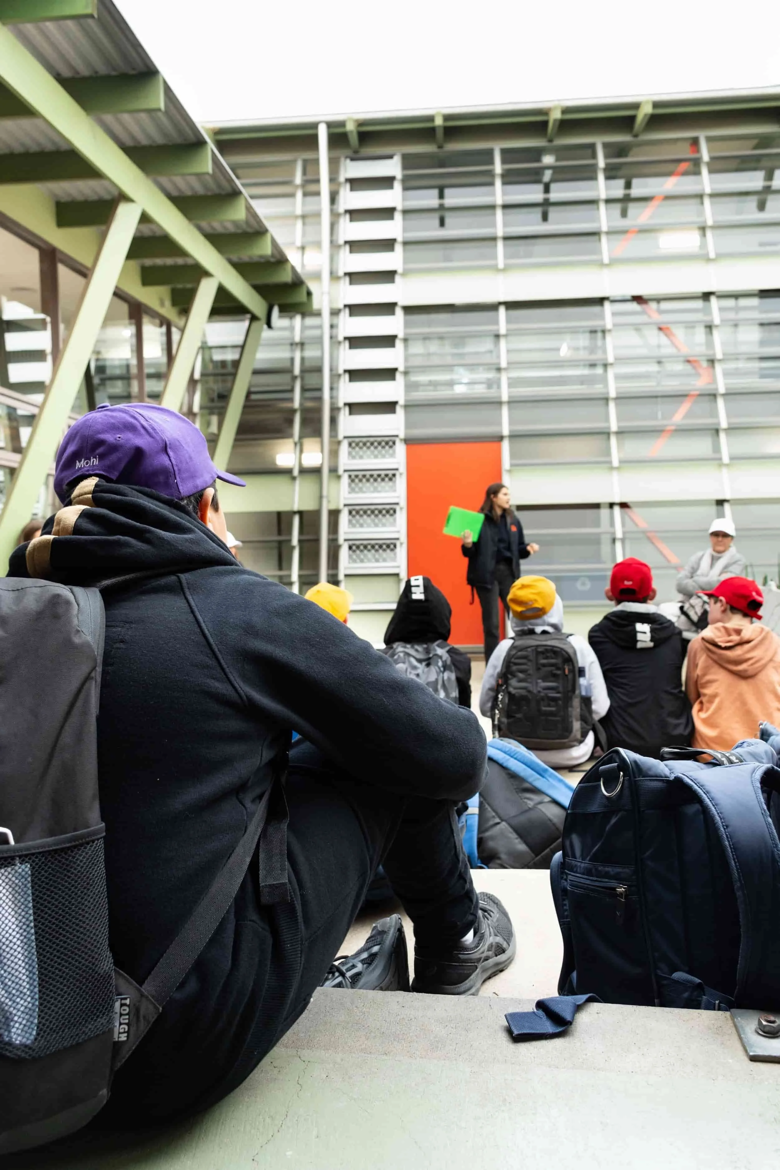 Urban Camp's Commitment to Child Safety with kids listening to a safety talk at Urban Camp