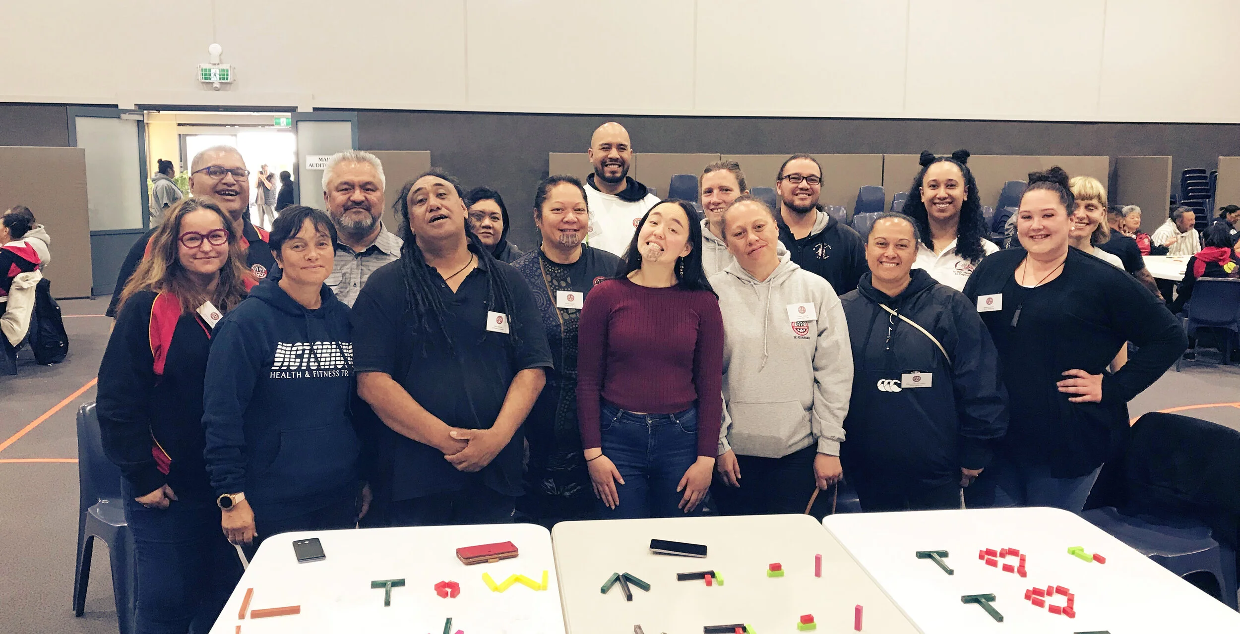 Group of learners &amp; their kaiako (the young woman in the middle of the picture) at an Ataarangi hui in Nov. 2019