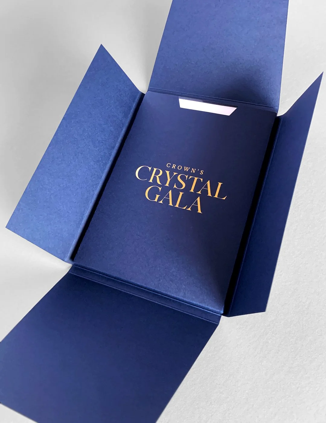 The sleeve then reveals an acrylic glass invitation (roughly 8mm thick) along with a supplementary card to provide more detail on the event itself (not shown).