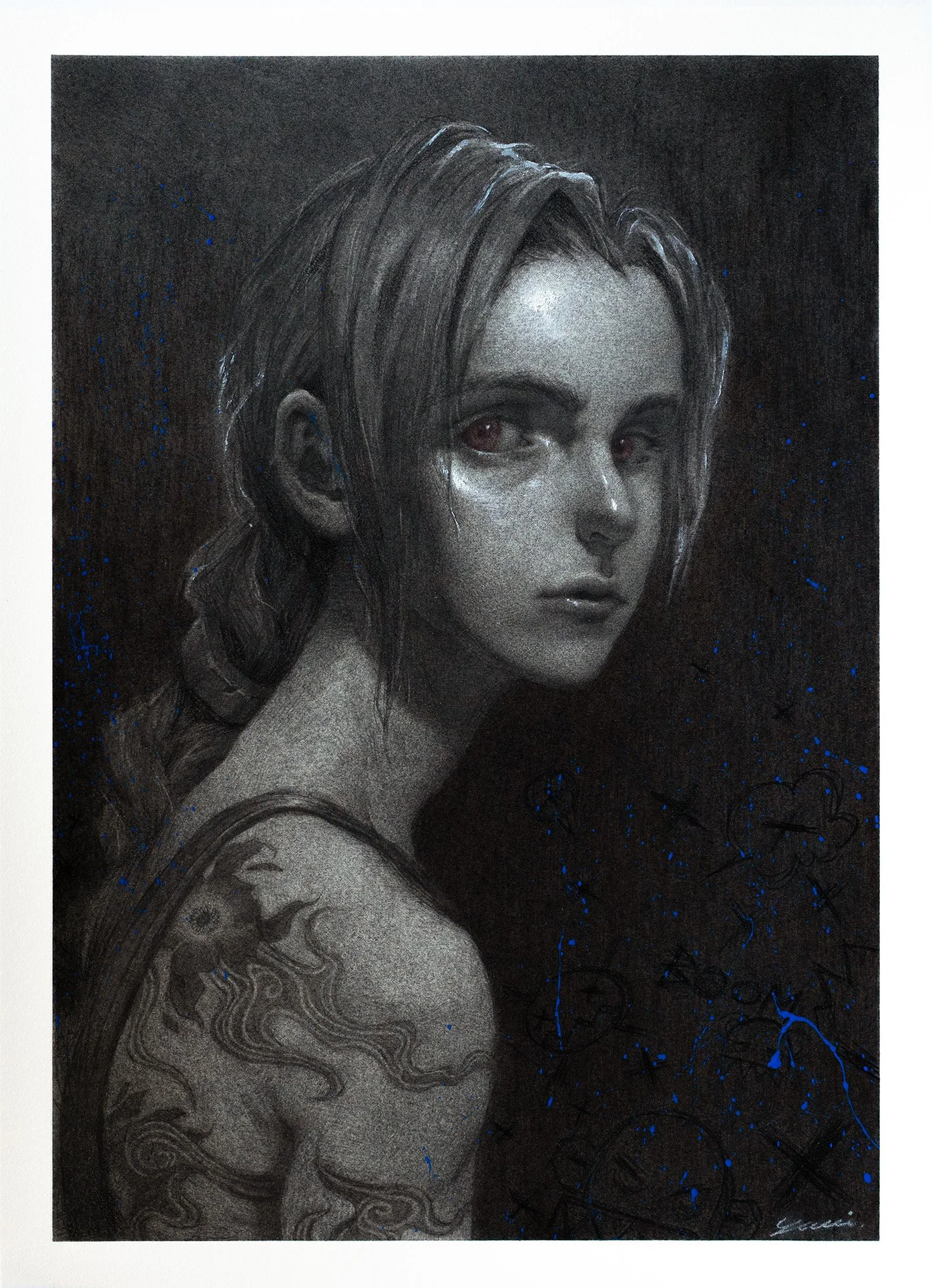 A detailed black and white portrait of a woman with long hair, tattooed shoulder, and intense eyes with a dark background featuring blue paint splatters and abstract designs.