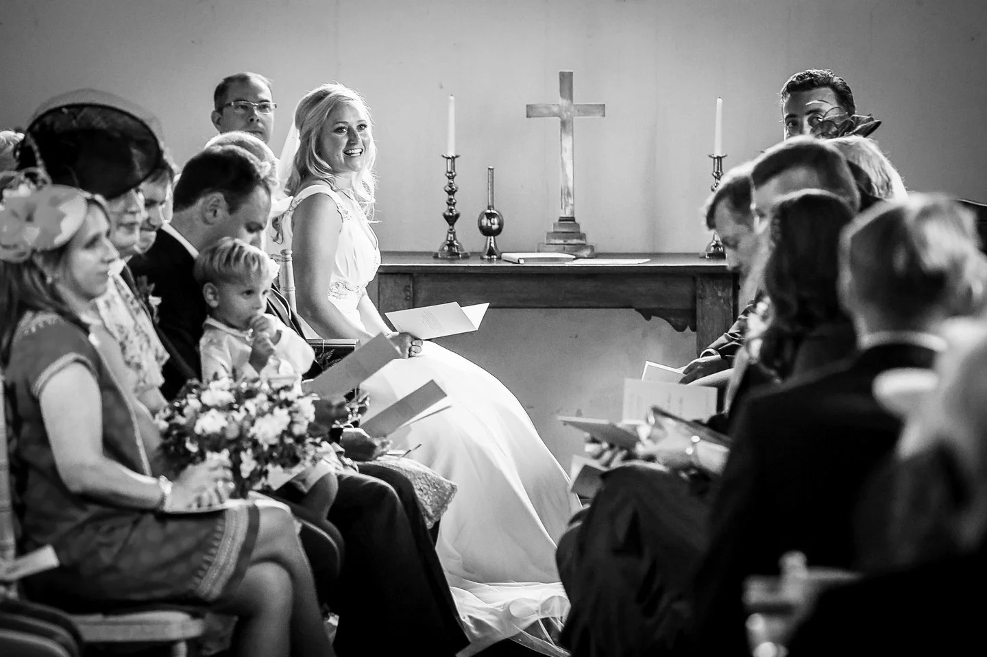 That moment when you look around the church during the first hymn and catch your friend's eye and smile because this is it, the big day has arrived and you're about to get married and everyone is here and the party is about to start and it's all pret