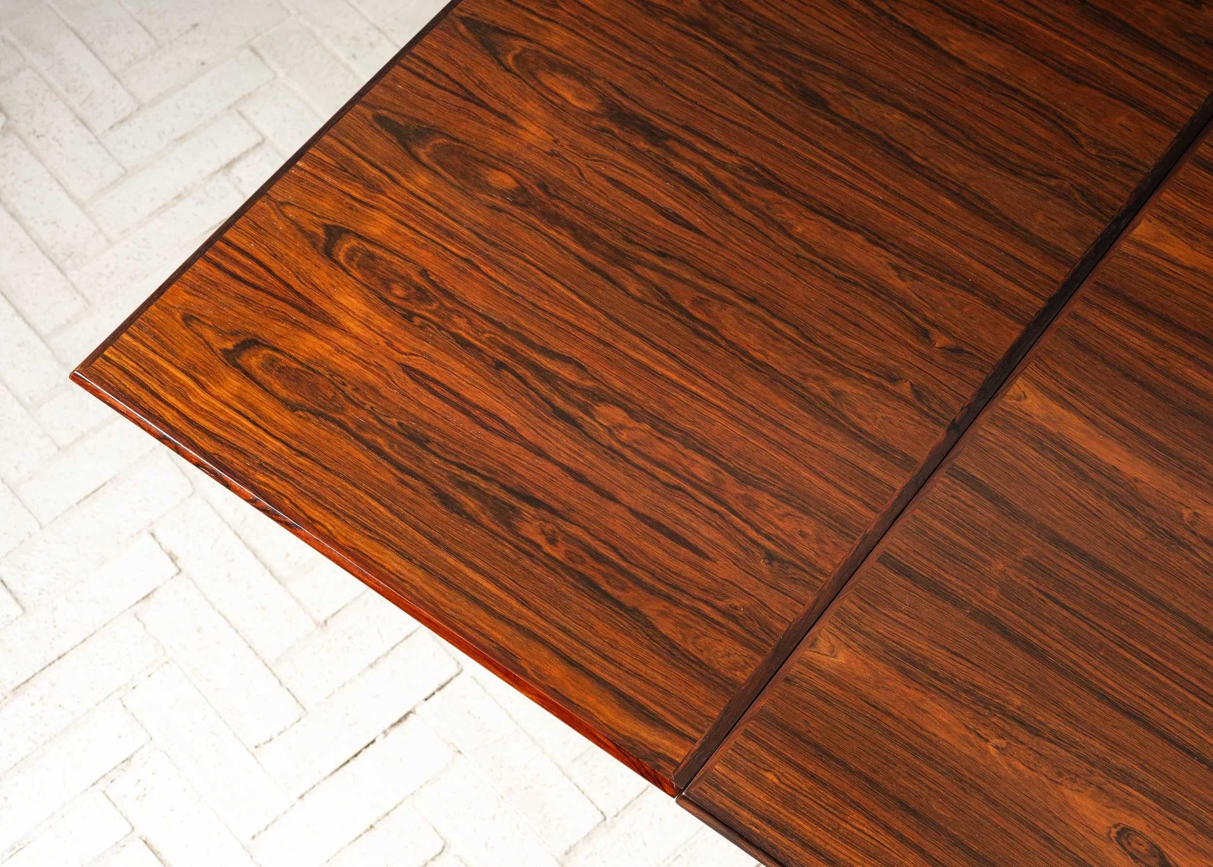 henning-kjaernulf-rosewood-dining-table-resideinc-12.jpg