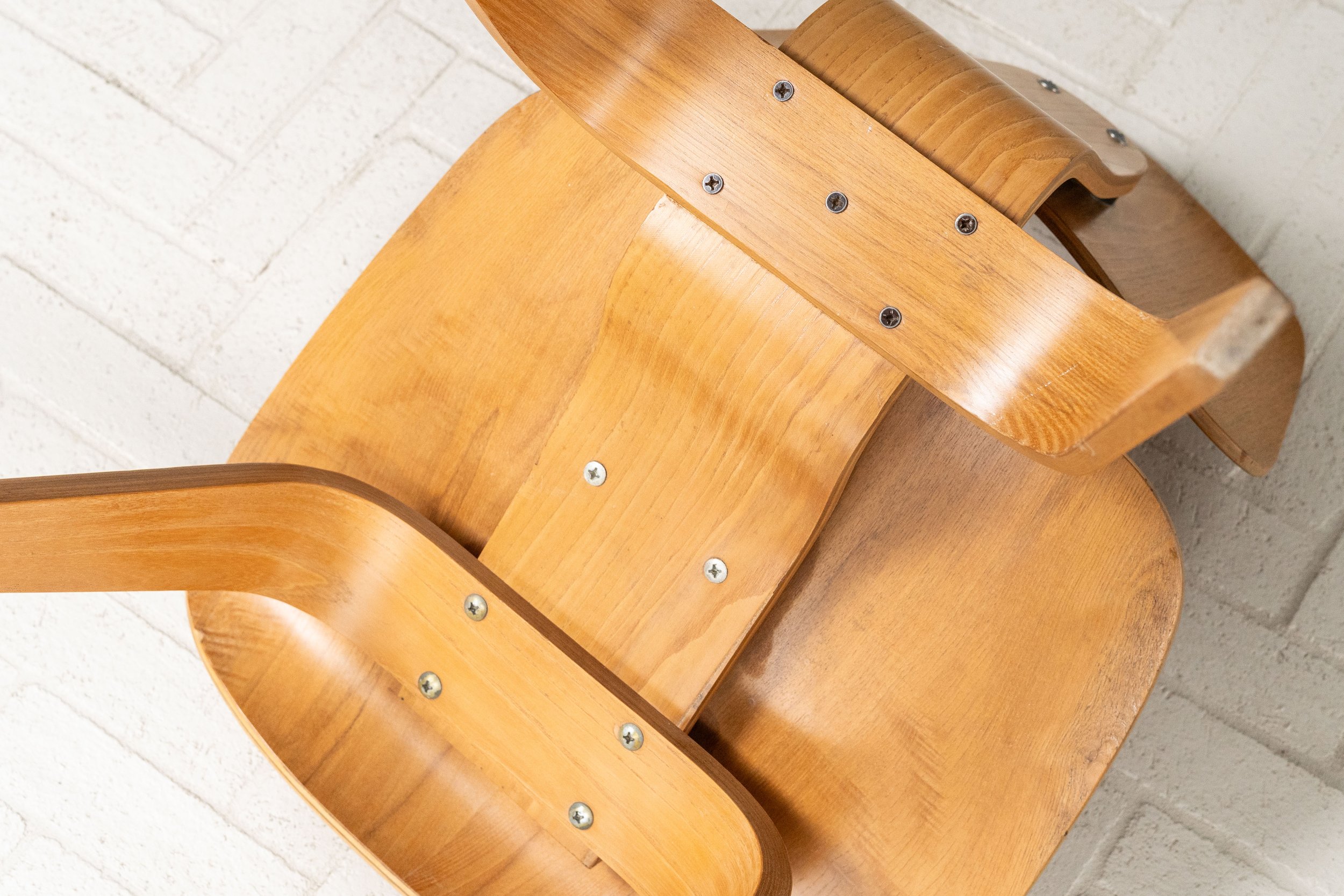 set-of-4-early-eames-dining-chairs-resideinc-18.jpg