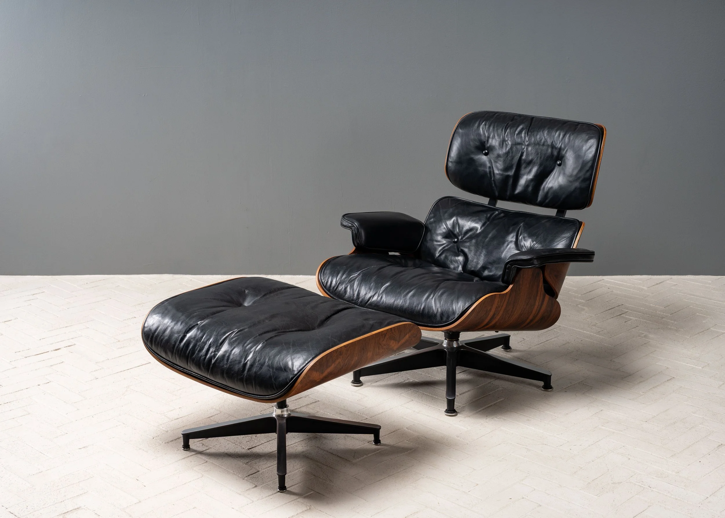 eames-rosewood-lounge-chair-and-ottoman-resideinc-2.jpg