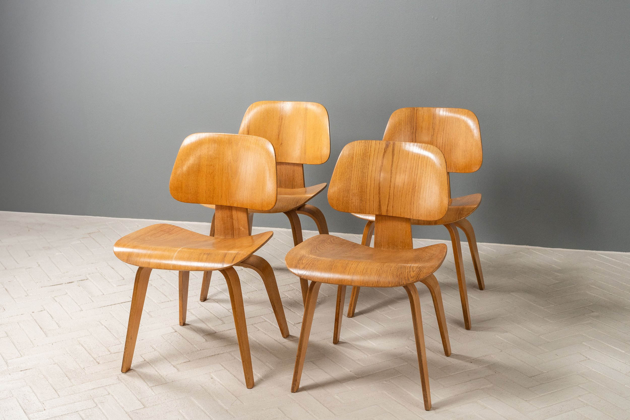 set-of-4-early-eames-dining-chairs-resideinc-1.jpg
