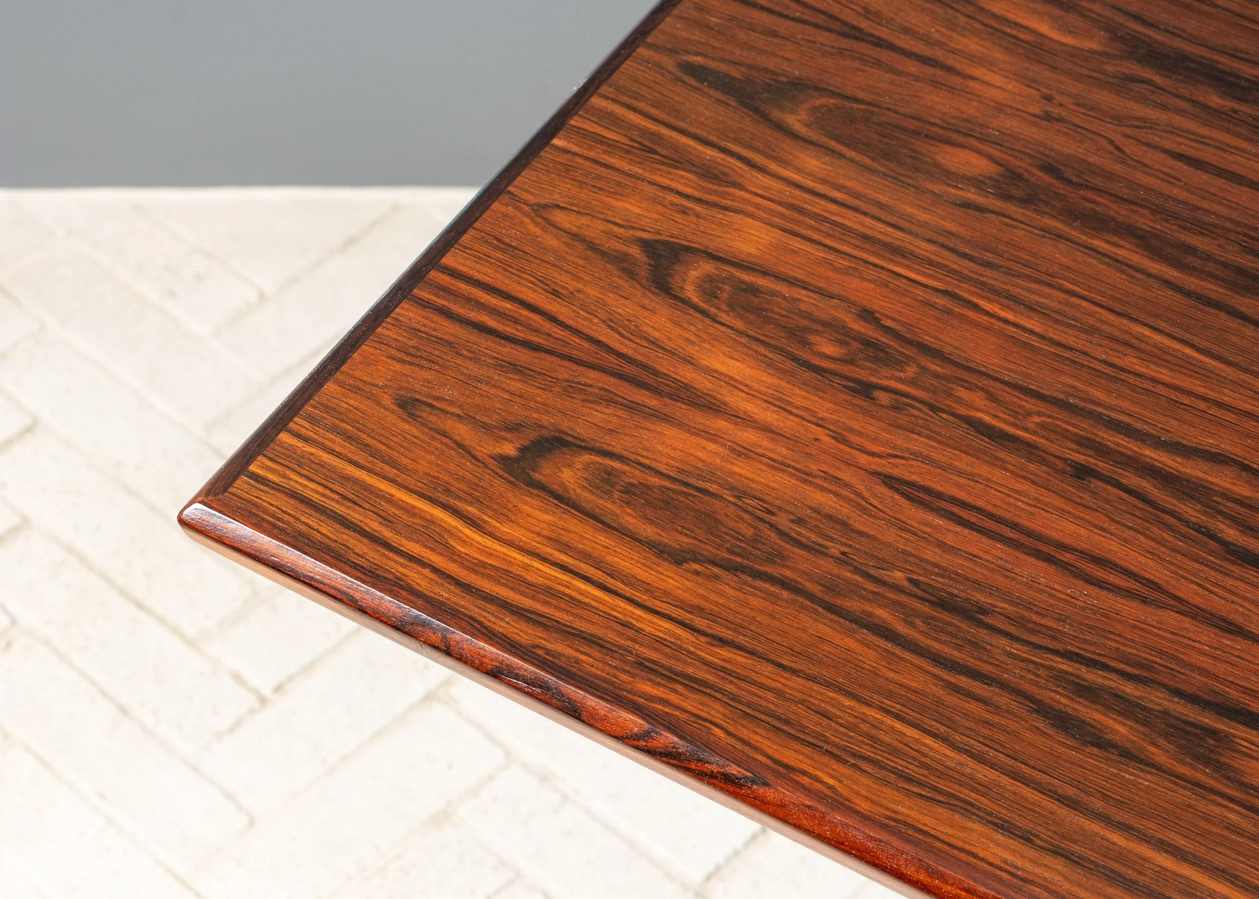 henning-kjaernulf-rosewood-dining-table-resideinc-10.jpg
