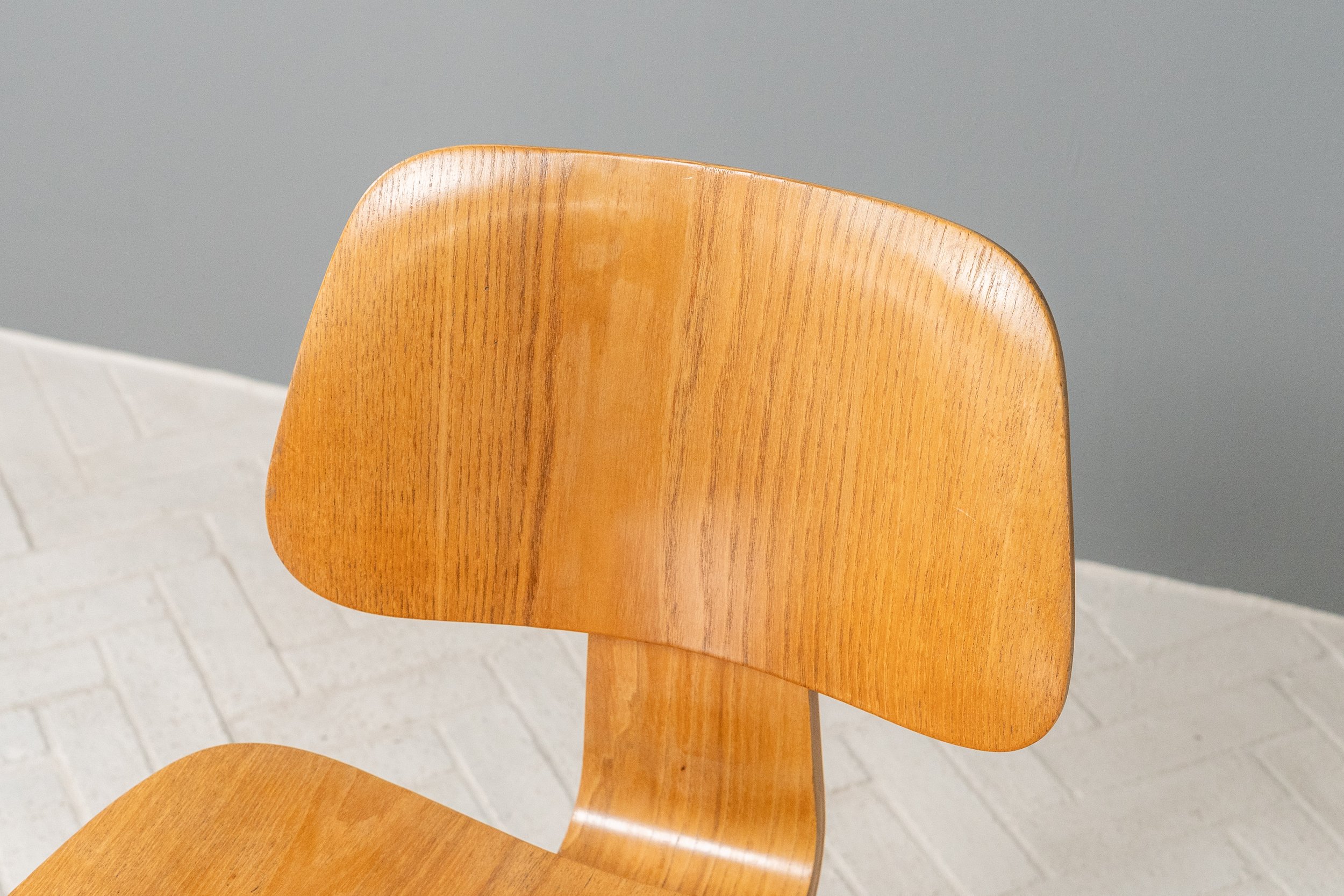 set-of-4-early-eames-dining-chairs-resideinc-14.jpg