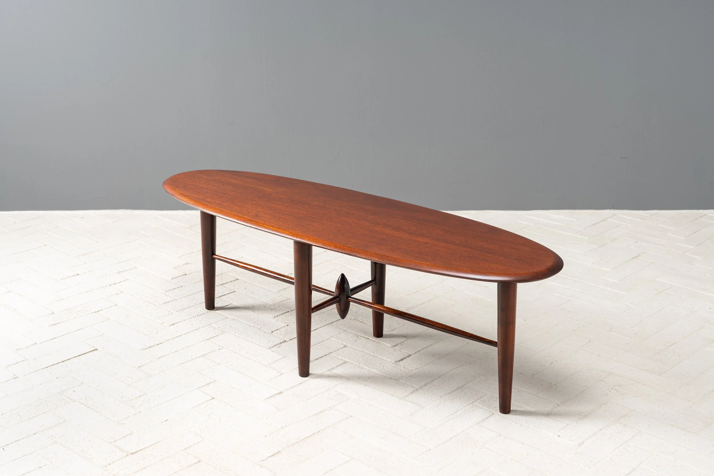 oval-mahogany-studio-coffee-table-resideinc-2.jpg
