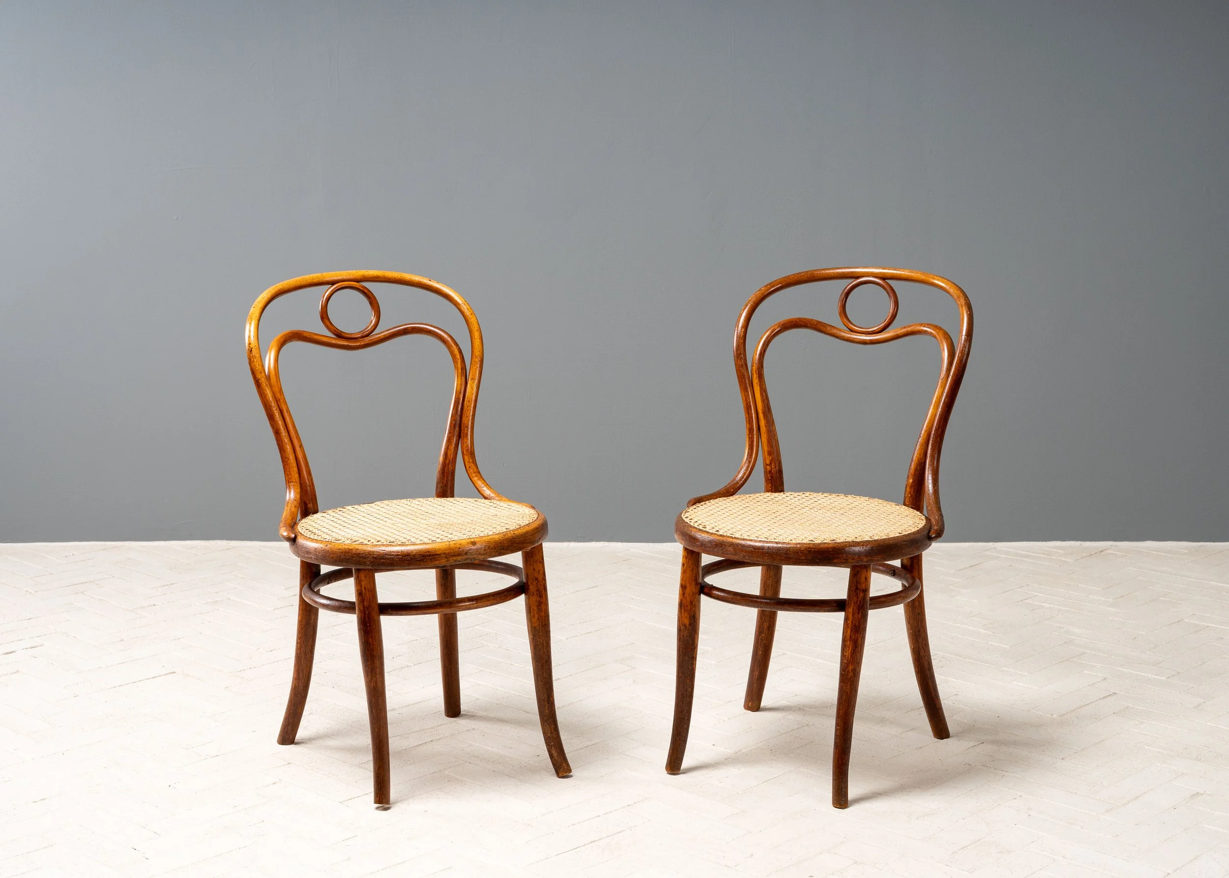 pair-of-thonet-bentwood-cane-bistro-chairs-reside-inc-1.jpg