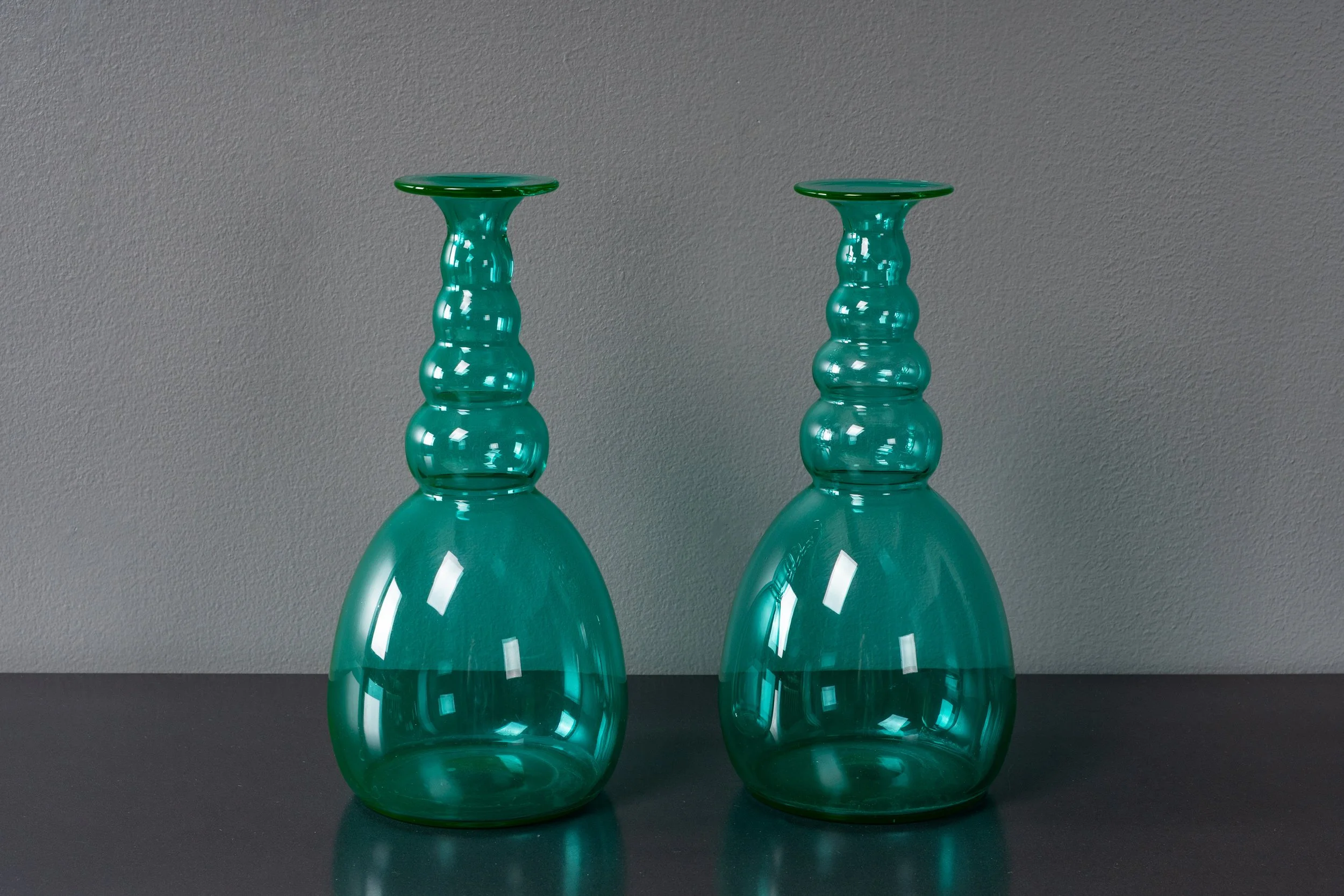 pair-of-italian-green-glass-decanters-resideinc-1.jpg
