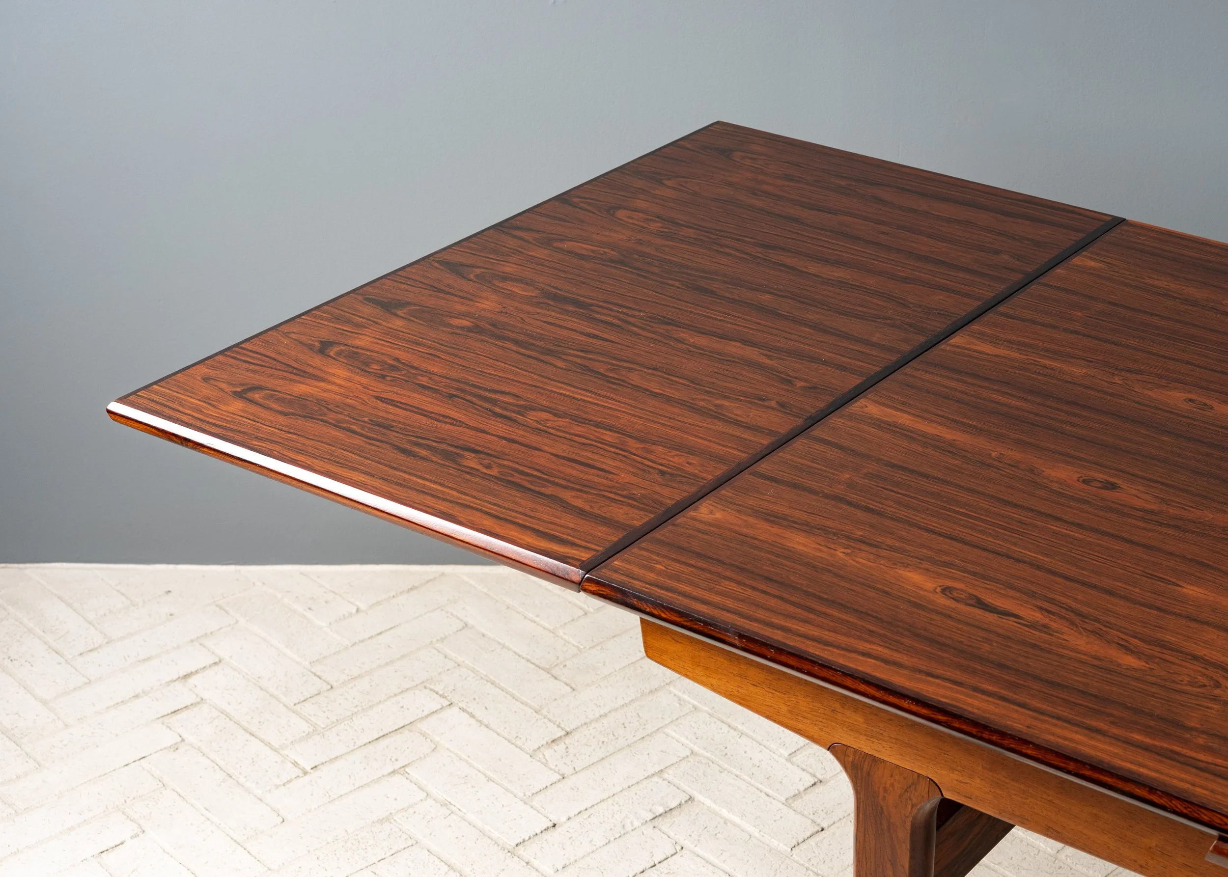 henning-kjaernulf-rosewood-dining-table-resideinc-8.jpg
