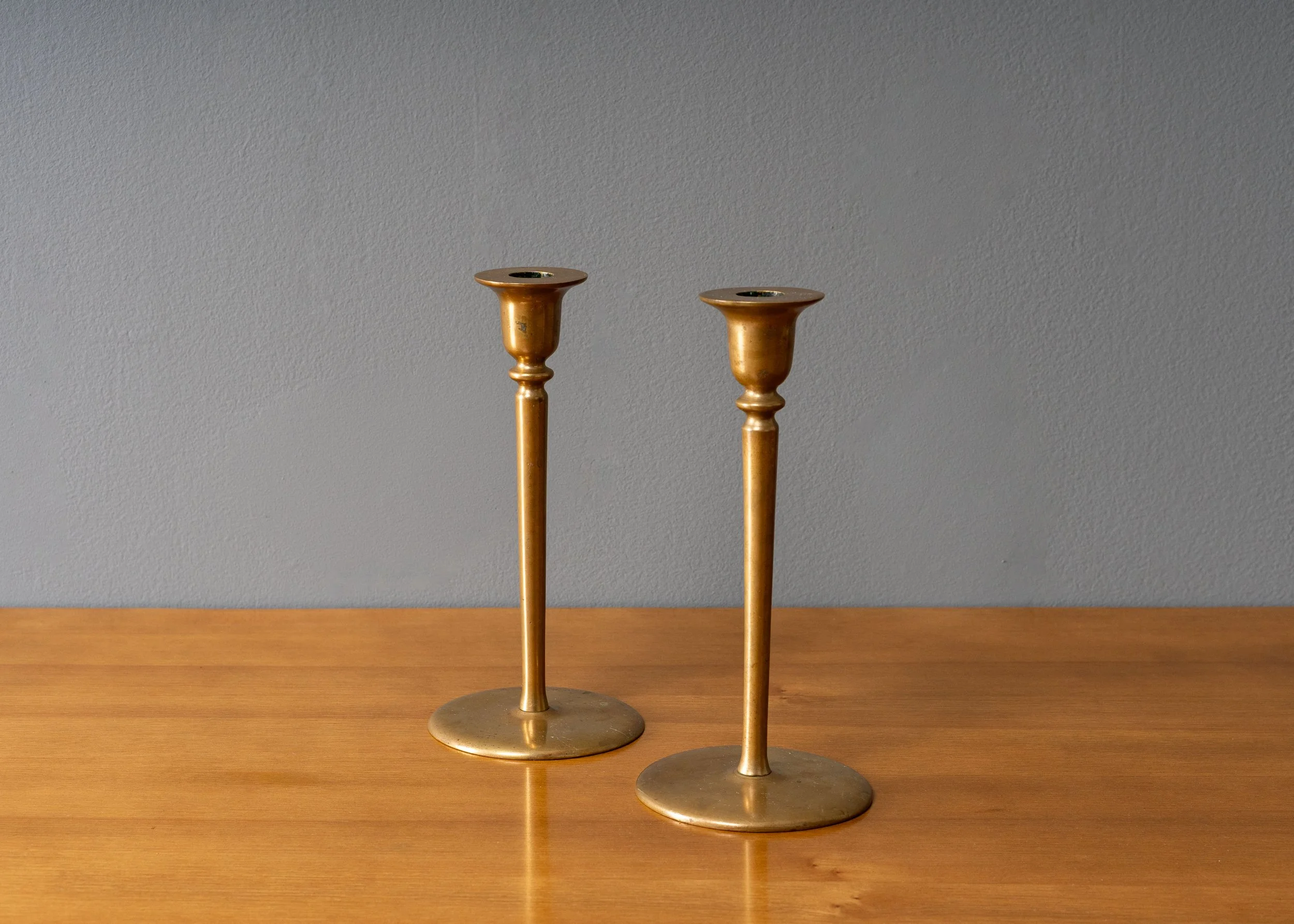 pair-of-brass-candlestick-holders-reside-inc-3.jpg