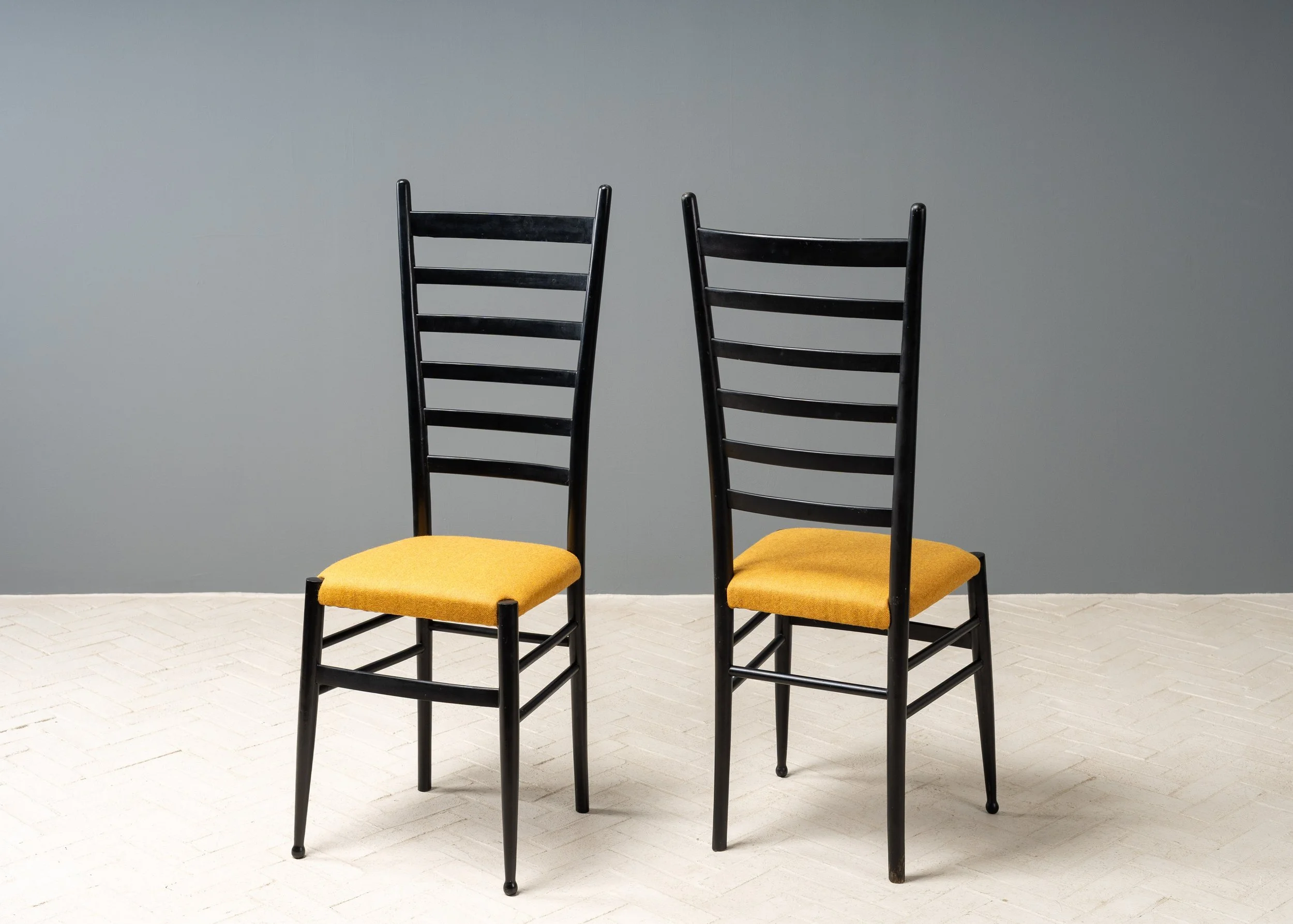 pair-of-gio-ponti-style-ladder-back-chairs-reside-inc-2.jpg