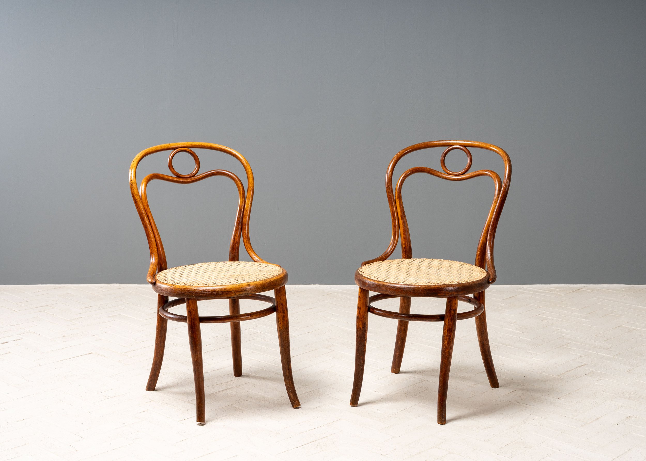 pair-of-thonet-bentwood-cane-cafe-chairs-reside-inc-1.jpg