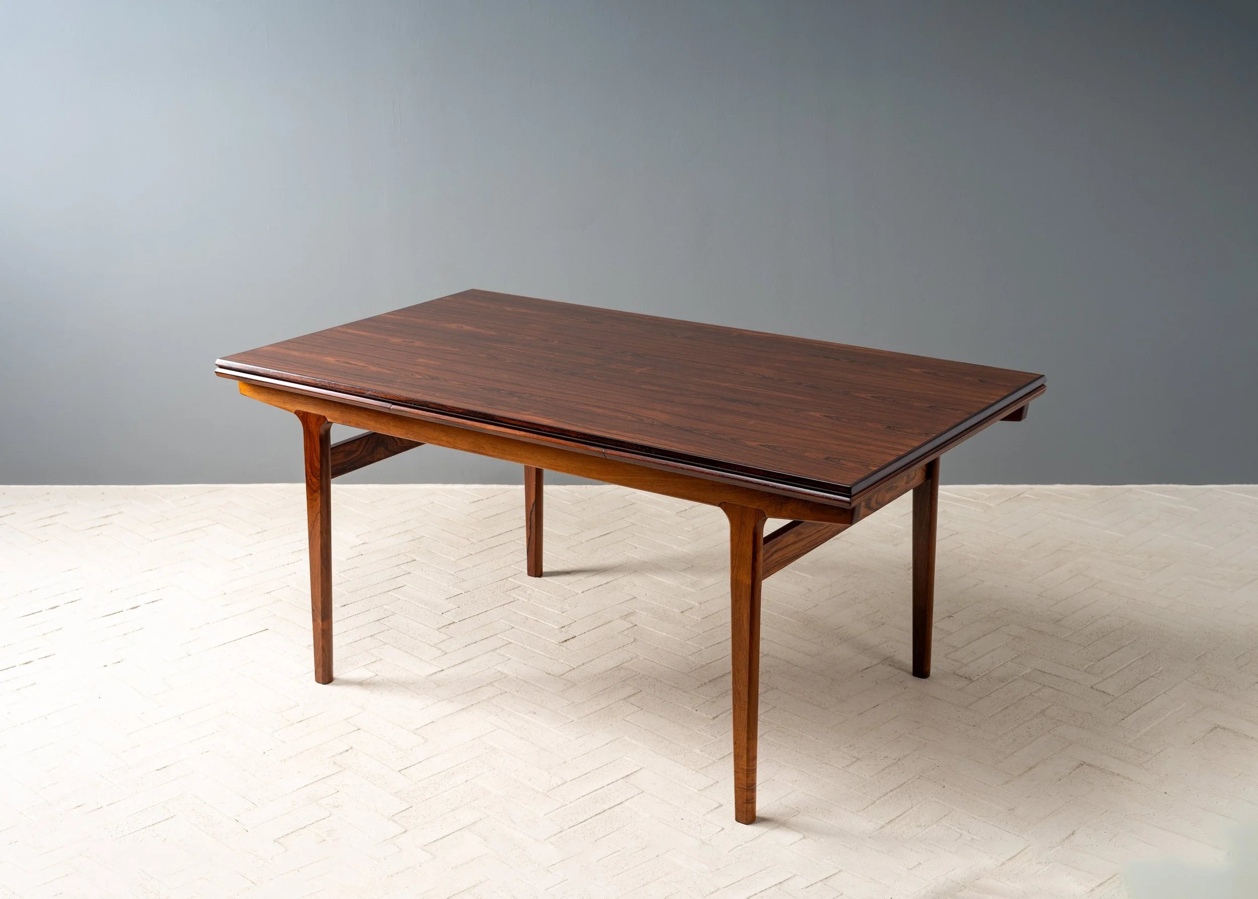 henning-kjaernulf-rosewood-dining-table-resideinc-13.jpg
