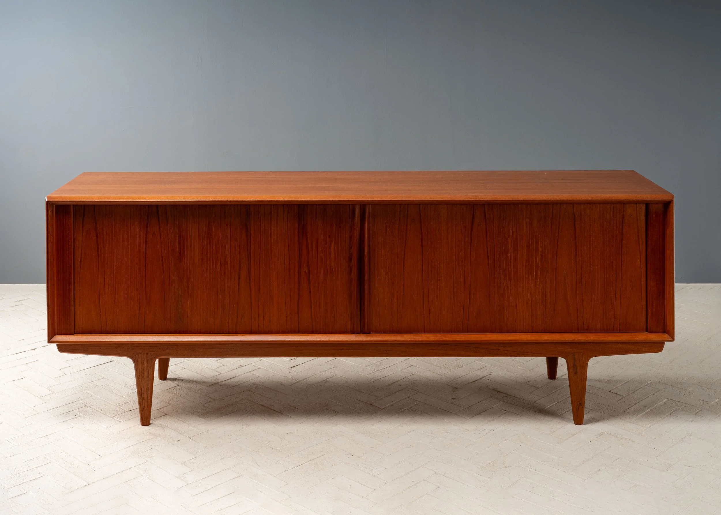 bernhard-pedersen-long-teak-sideboard-resideinc-1.jpg