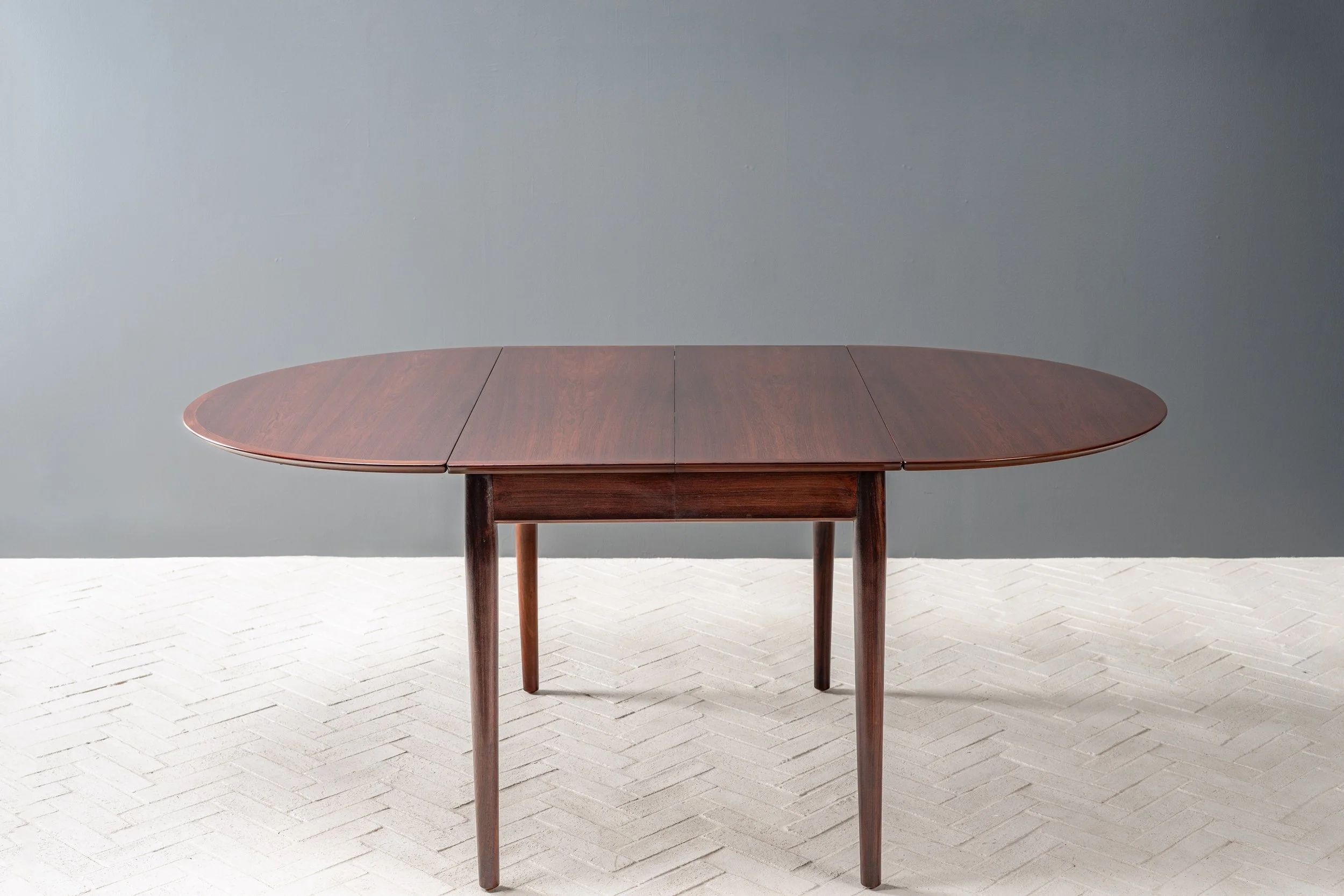 arne-vodder-model-227-rosewood-dining-table-resideinc-1.jpg