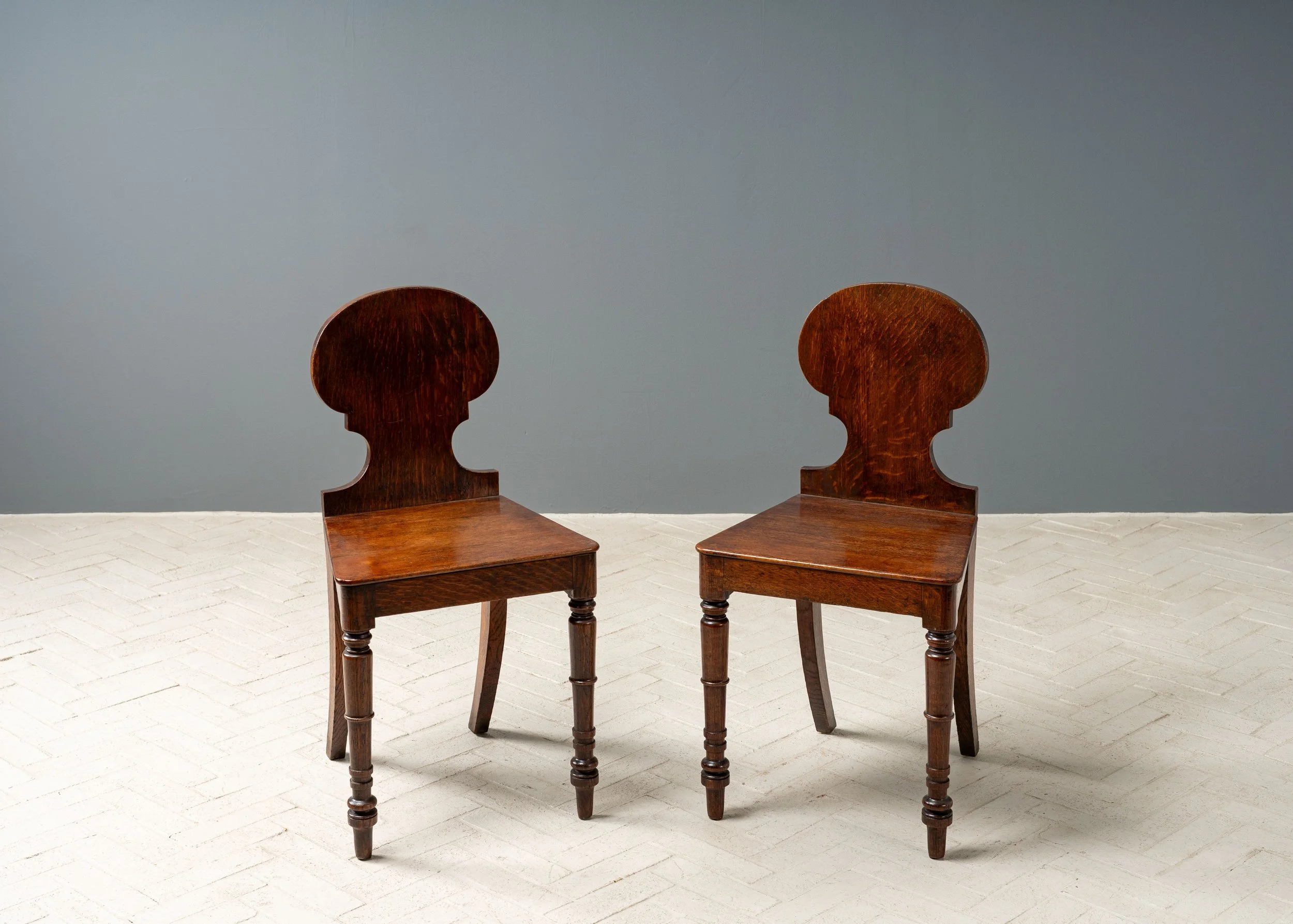 pair-of-antique-english-hall-chairs-resideinc-1.jpg