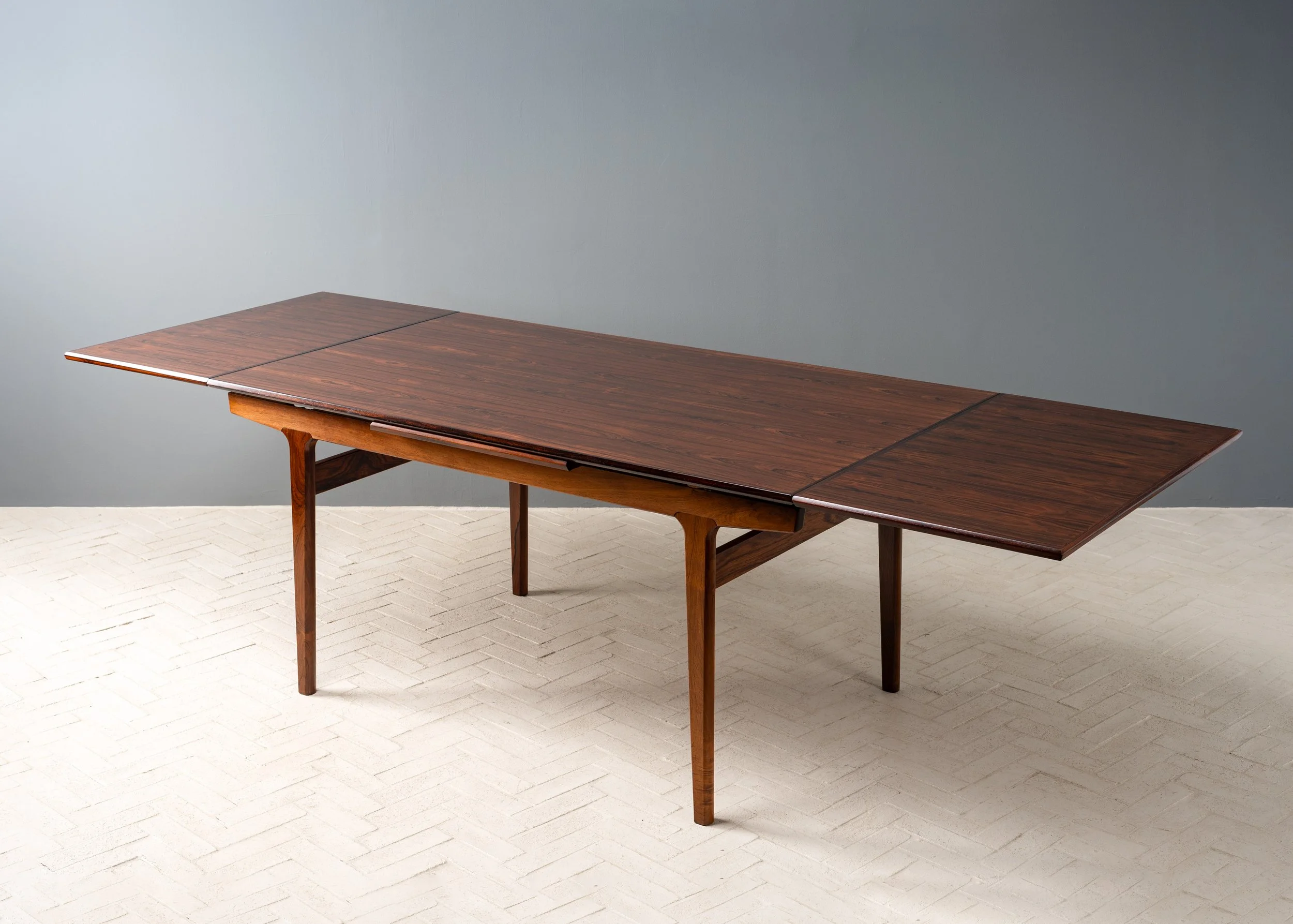 henning-kjaernulf-rosewood-dining-table-resideinc-6.jpg