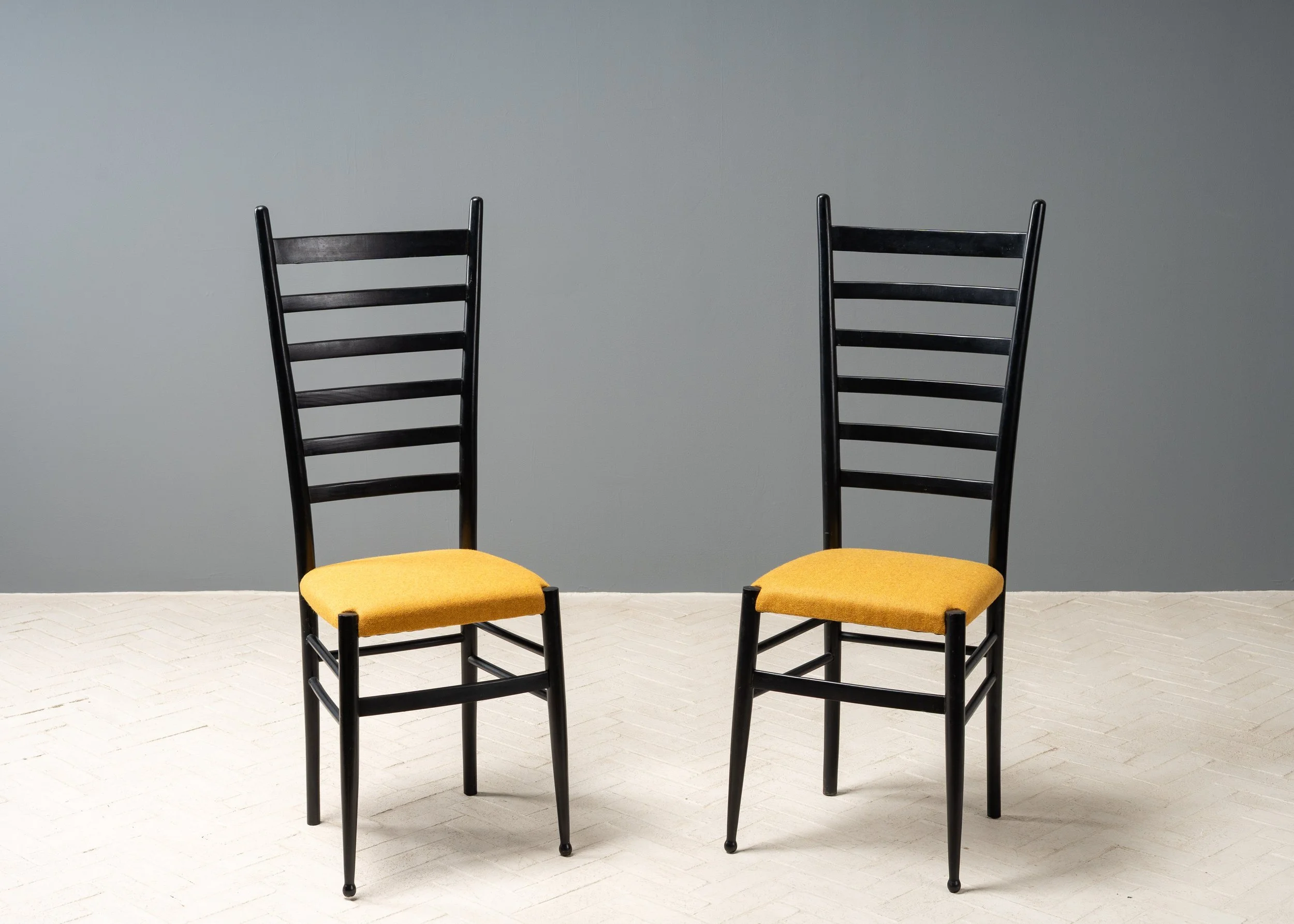pair-of-gio-ponti-style-ladder-back-chairs-reside-inc-1.jpg