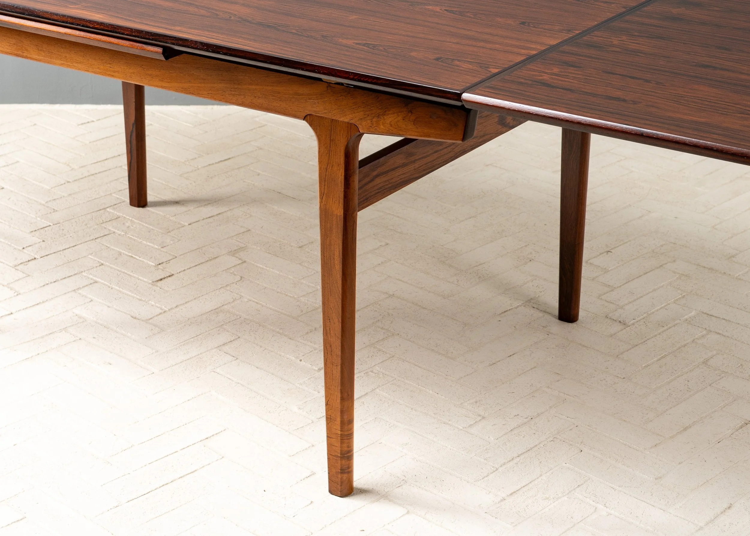 henning-kjaernulf-rosewood-dining-table-resideinc-7.jpg