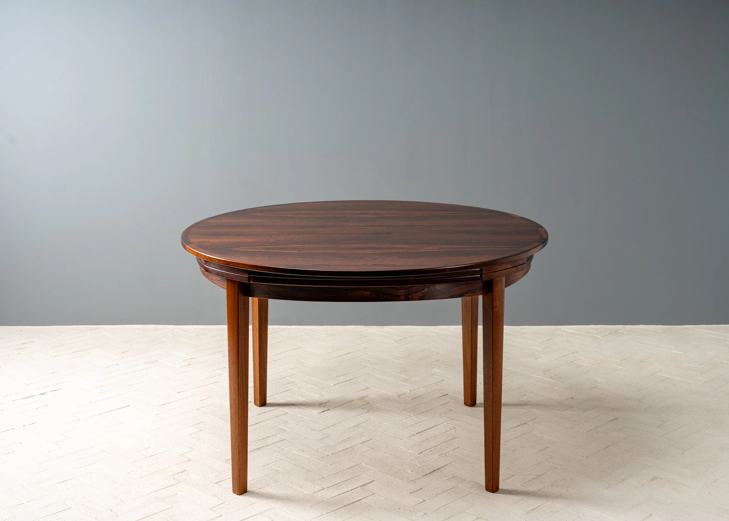 dyrlund-rosewood-round-flip-flap-dining-table-resideinc-13.jpg