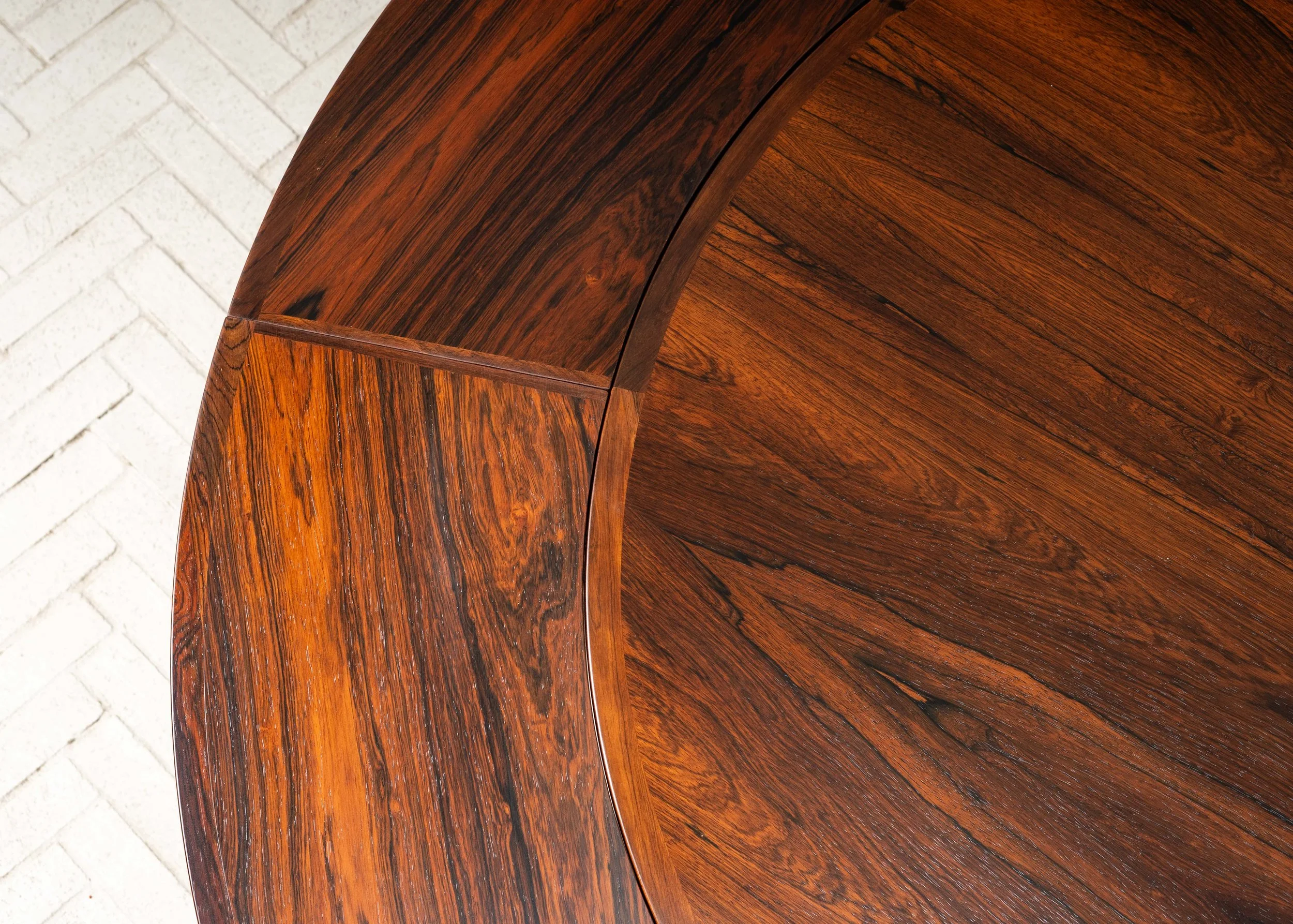 dyrlund-rosewood-round-flip-flap-dining-table-resideinc-21.jpg