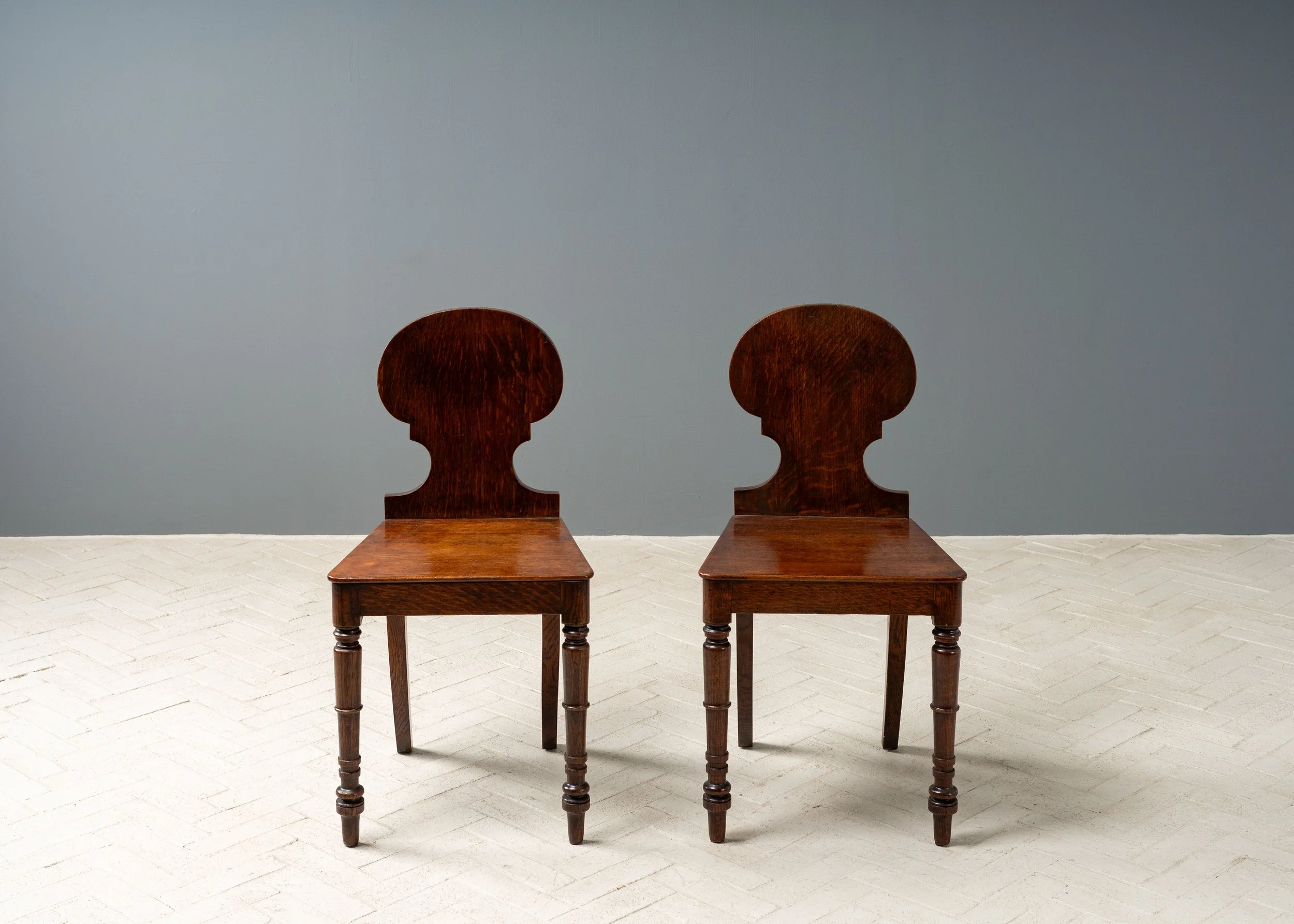 pair-of-antique-english-hall-chairs-resideinc-2.jpg