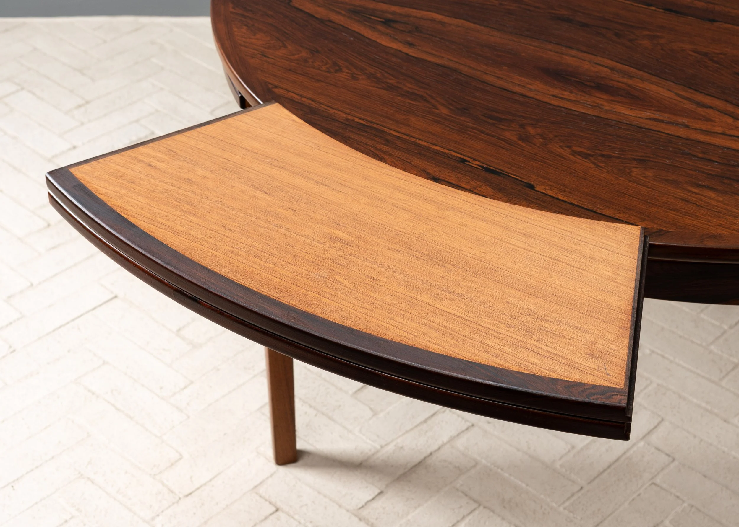 dyrlund-rosewood-round-flip-flap-dining-table-resideinc-17.jpg