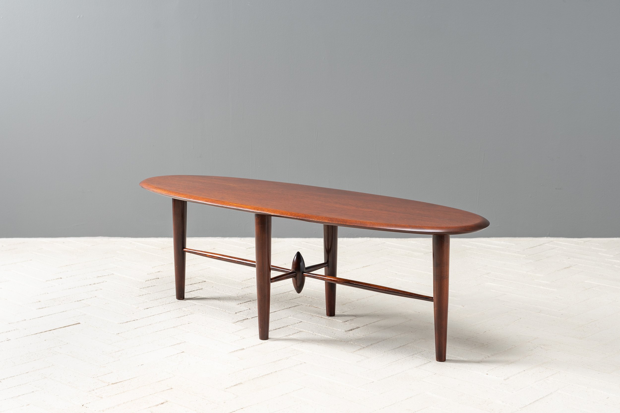 oval-mahogany-studio-coffee-table-resideinc-3.jpg