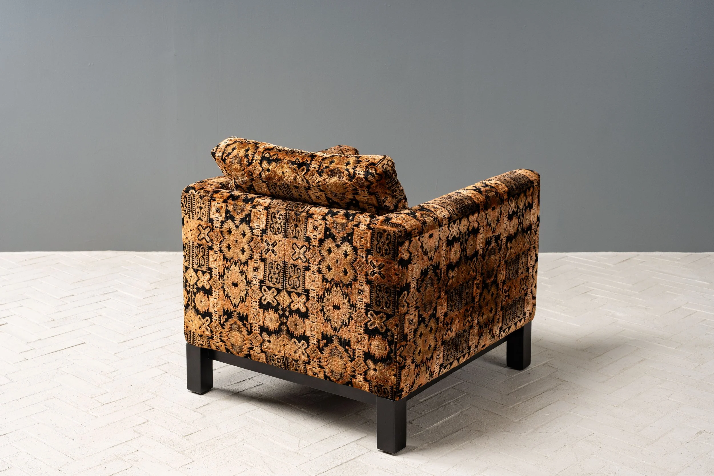 charak-lounge-chairs-with-ebonized-bases-resideinc-10.jpg
