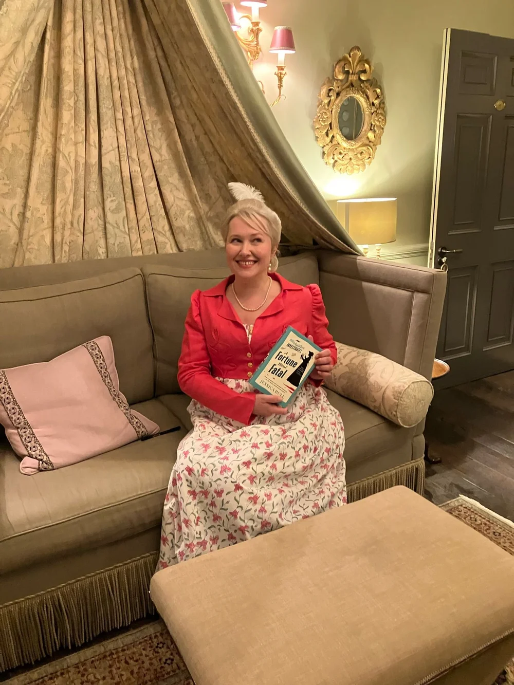 Jess sitting with book.jpeg