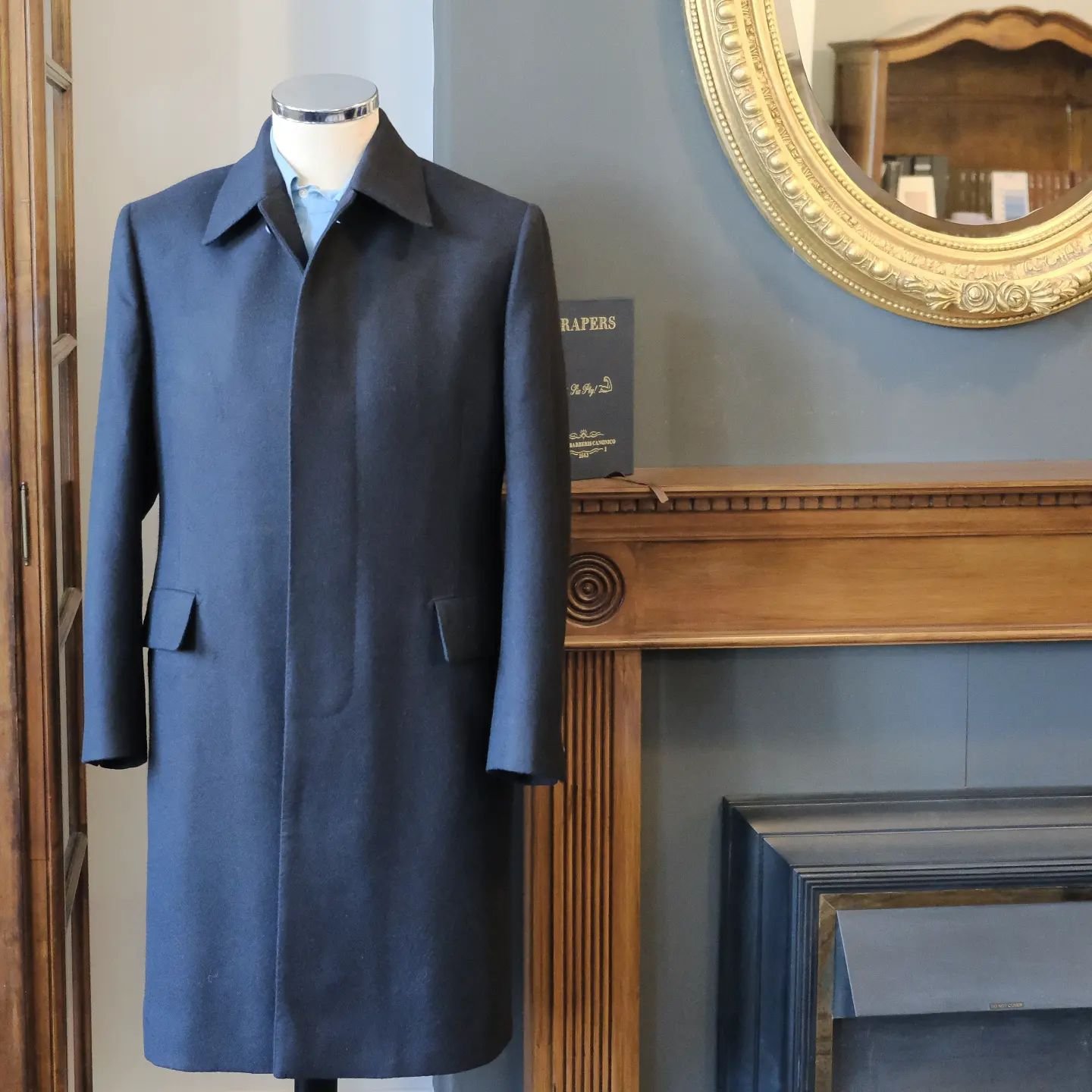 Winter coat with stand and fall collar and fly front