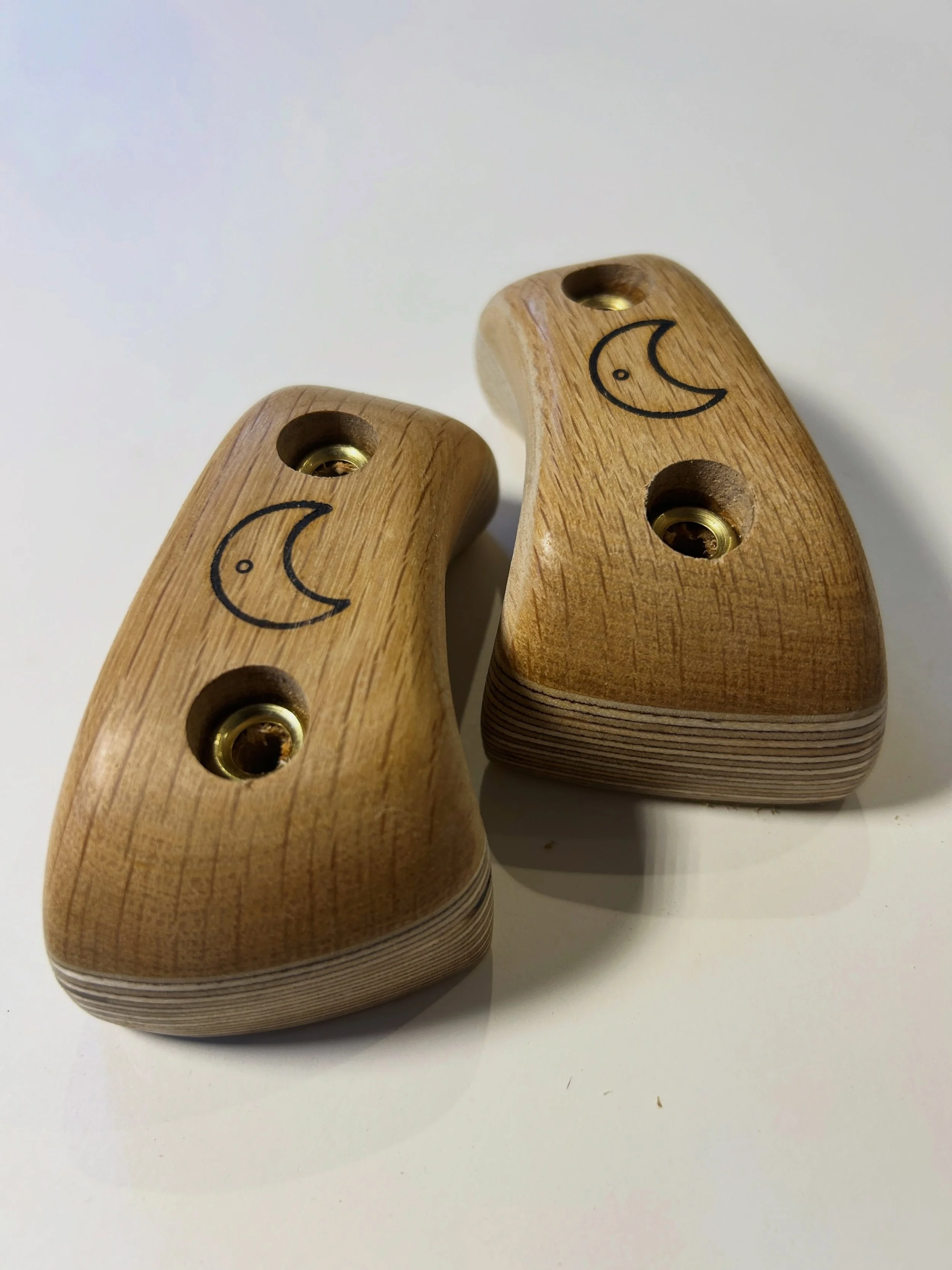 Oak and Birch ply pair. Crimpy pinchy holds one of my favourite shapes - inspired by a hold off the moon board. On the webshop now.