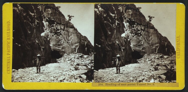 Tea carrier at tunnel during construction of the transcontinental railroad, about 1867. Library of Congress.