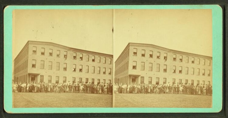 Calvin Sampson's shoe factory with employees out front. New York Public Library.