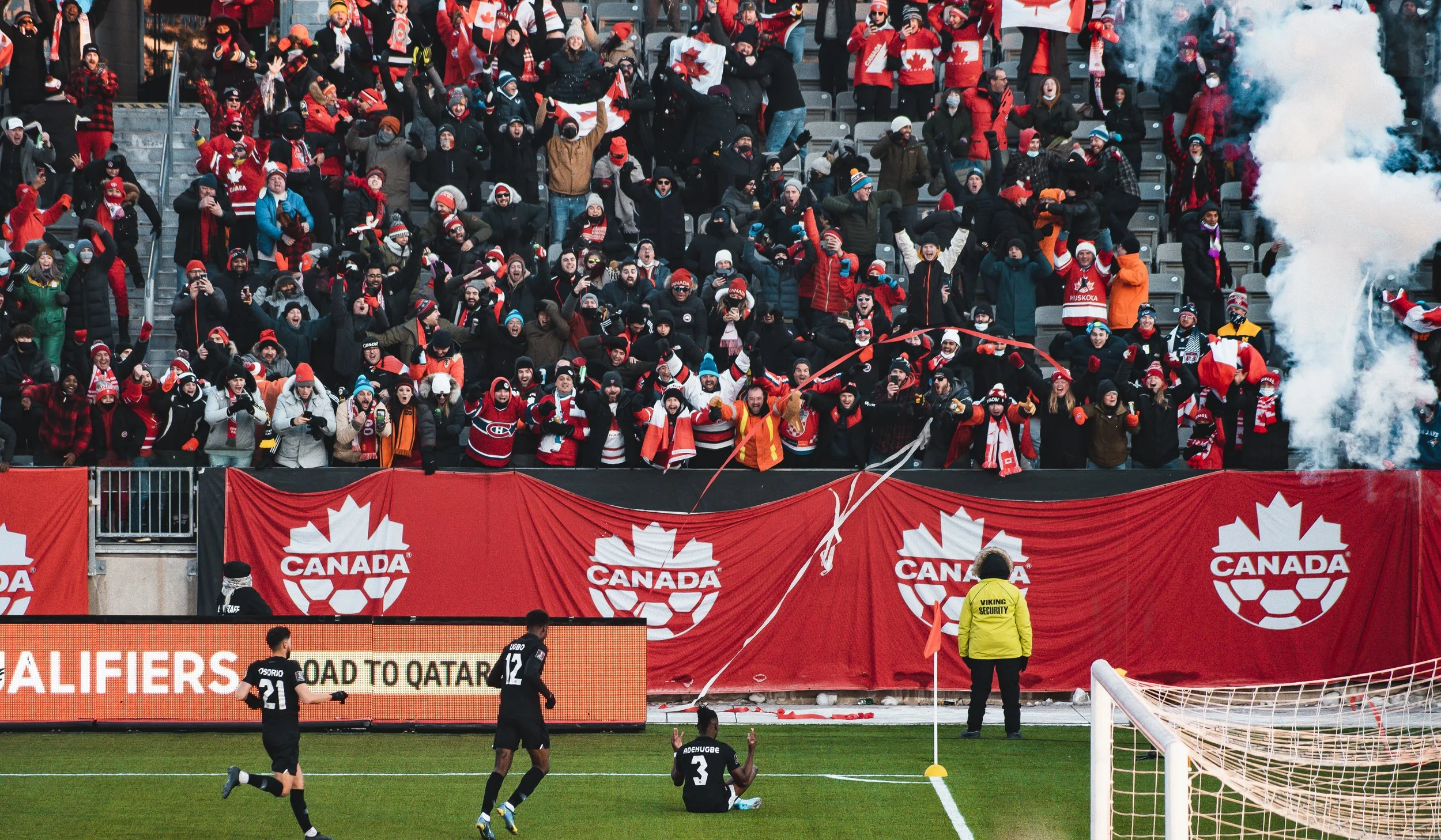 CANMNT right back Sam Adekugbe celebrates his stoppage-time goal during Canada's 2-0 victory over the United States in a World Cup qualifying match at Tim Hortons Field in Hamilton, Ontario. January 30, 2022. (Kaj Larsen Photo)