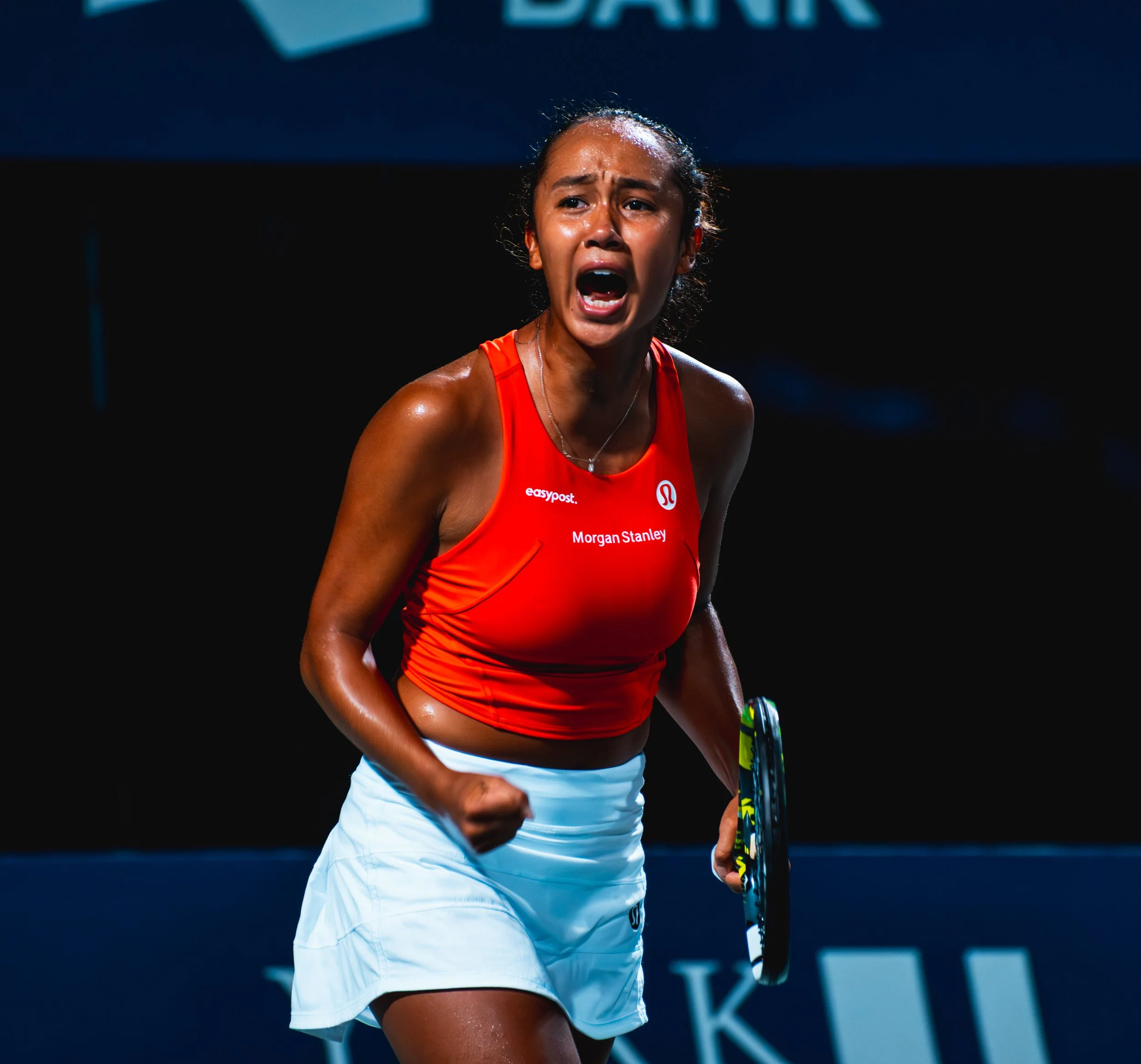 Leylah Annie Fernandez roars in celebration after scoring the winning point in her Round of 64 matchup vs. Storm Hunter on centre court at the National Bank Open. August 8, 2022. (Kaj Larsen Photo for Tennis Canada)
