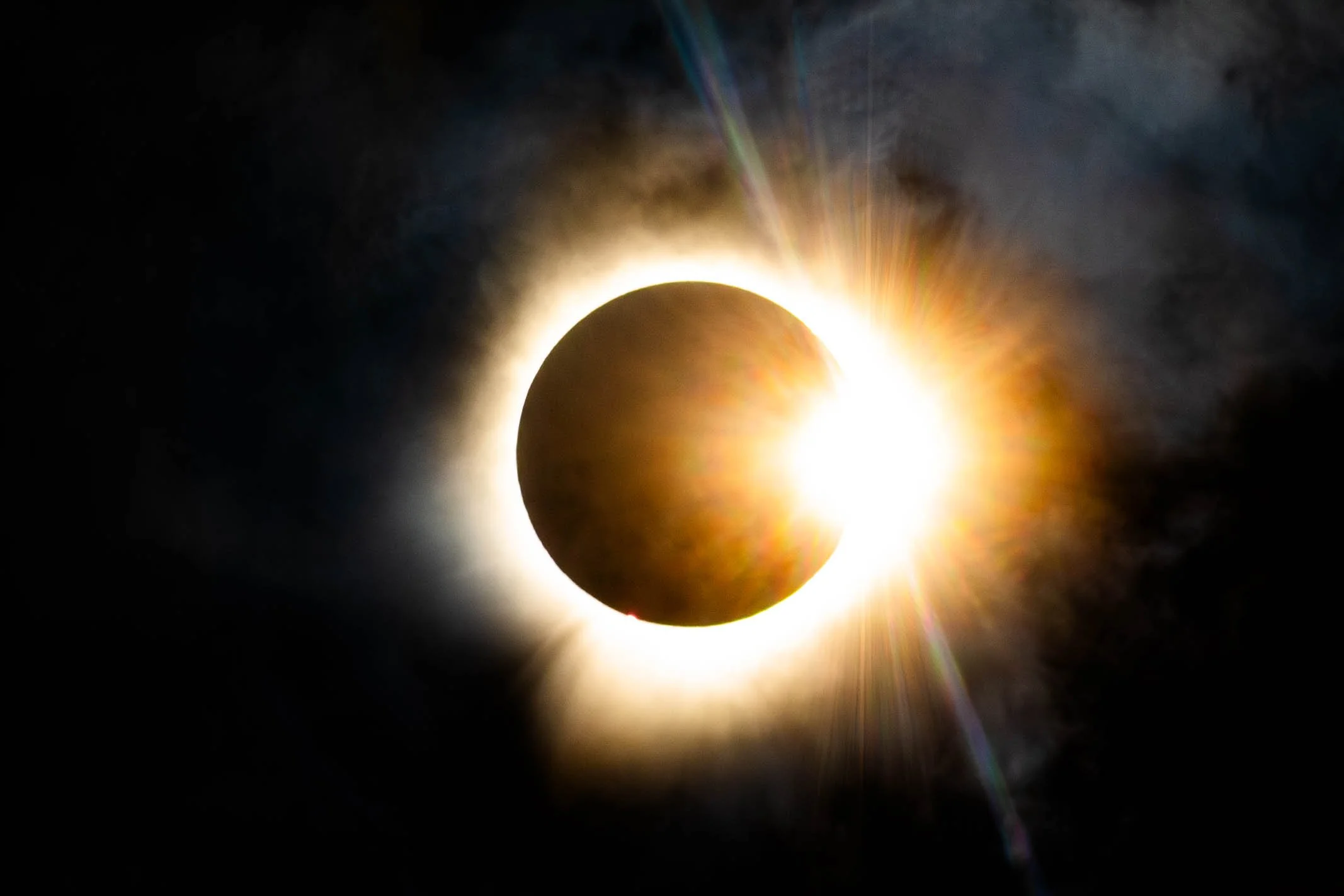 The Sun begins to reveal behind the moon as totality ends, during a solar eclipse in Burlington Ontario. April 8th, 2024. (Kaj Larsen Photo)