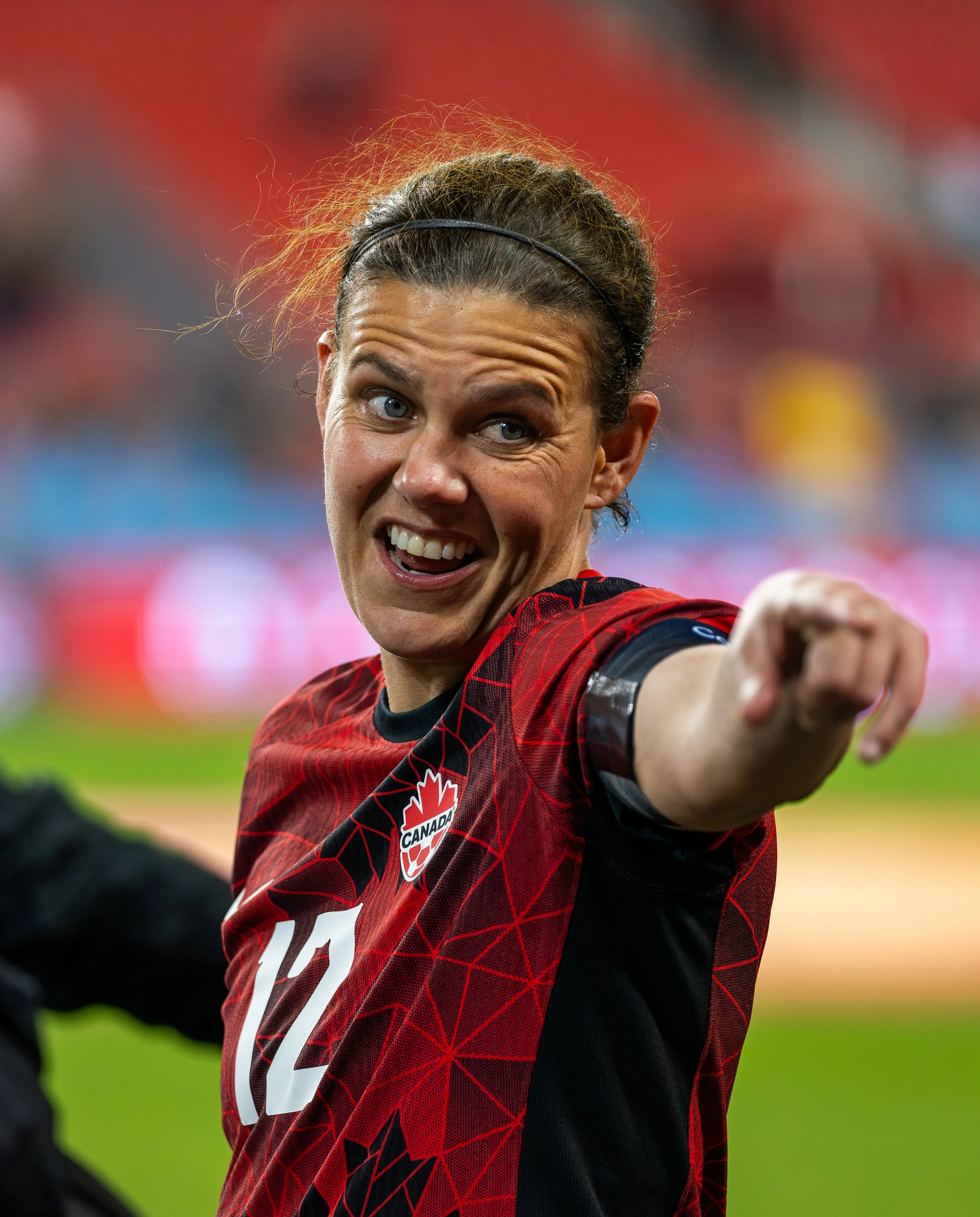 Christine Sinclair points to a teammate during Canada's 2-1 victory over Jamaica in the Concacaf W Championship. September 26, 2023. (Kaj Larsen Photo for the Canadian Premier League)