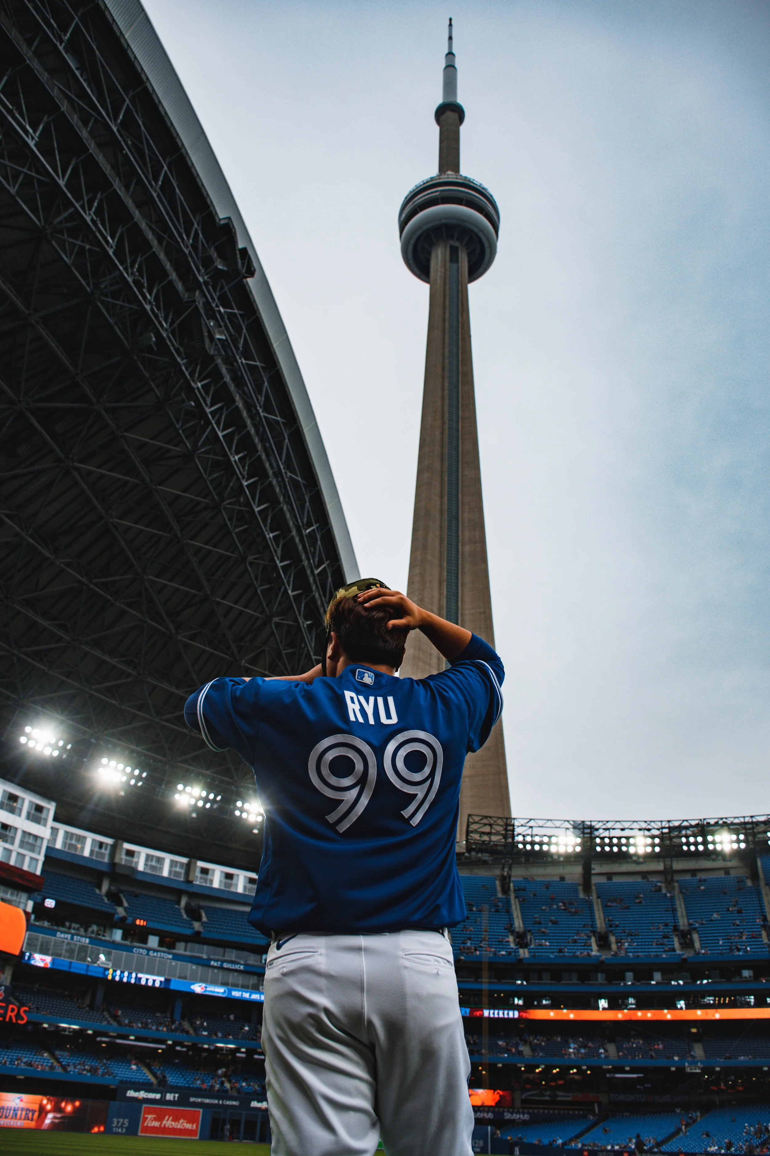 Toronto Blue Jays' pitcher Hyun Jin Ryu takes in the view ahead of his win against the Cincinnati Reds. Ryu pitched 6.0 shutout innings, striking out three batters. May 20, 2022. (Kaj Larsen Photo)