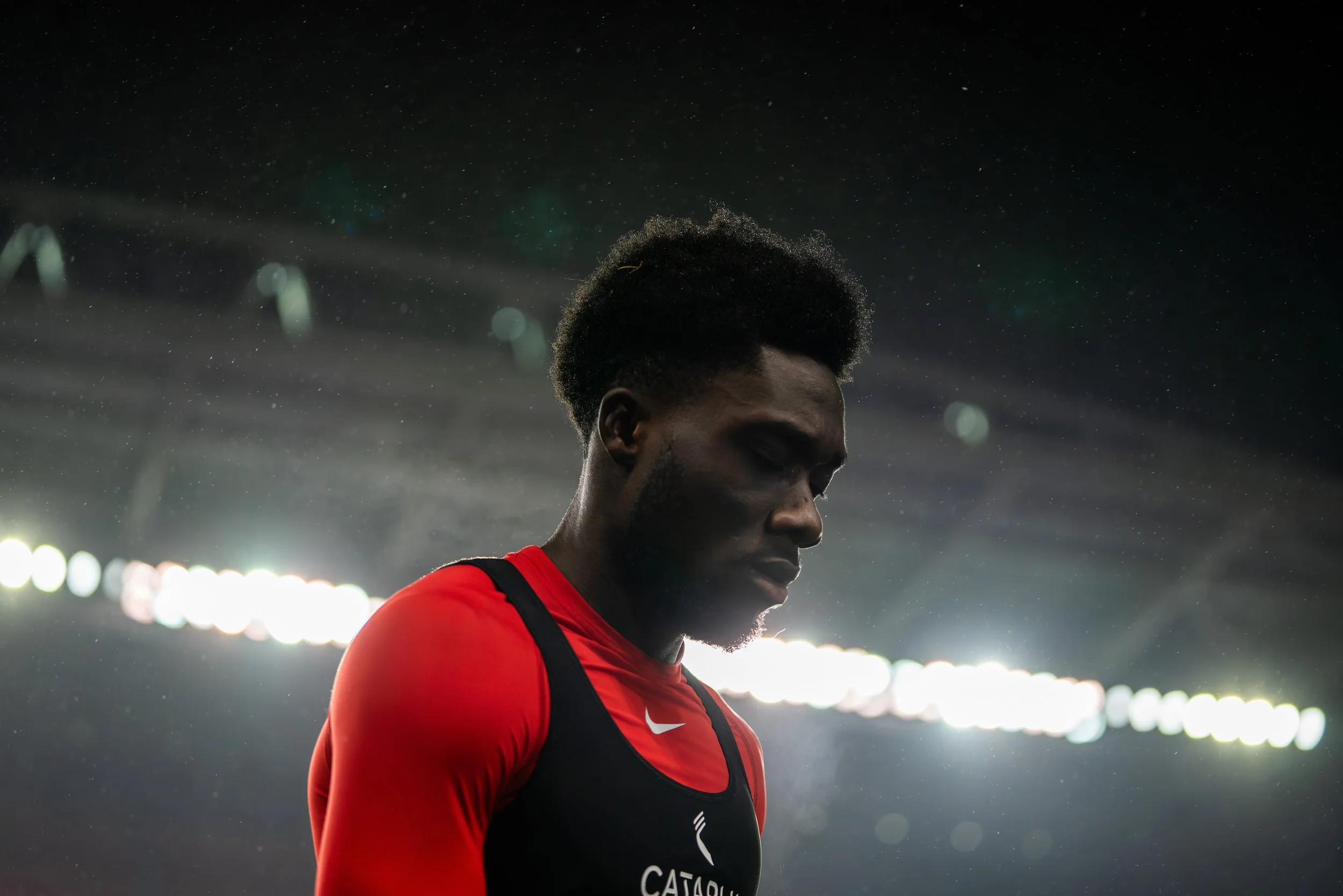 Canada's Alphonso Davies leaves the field dismayed following a 3-2 loss to Jamaica in the Nations League quarterfinals in Toronto. November 21, 2023. (Kaj Larsen Photo for the Canadian Premier League)