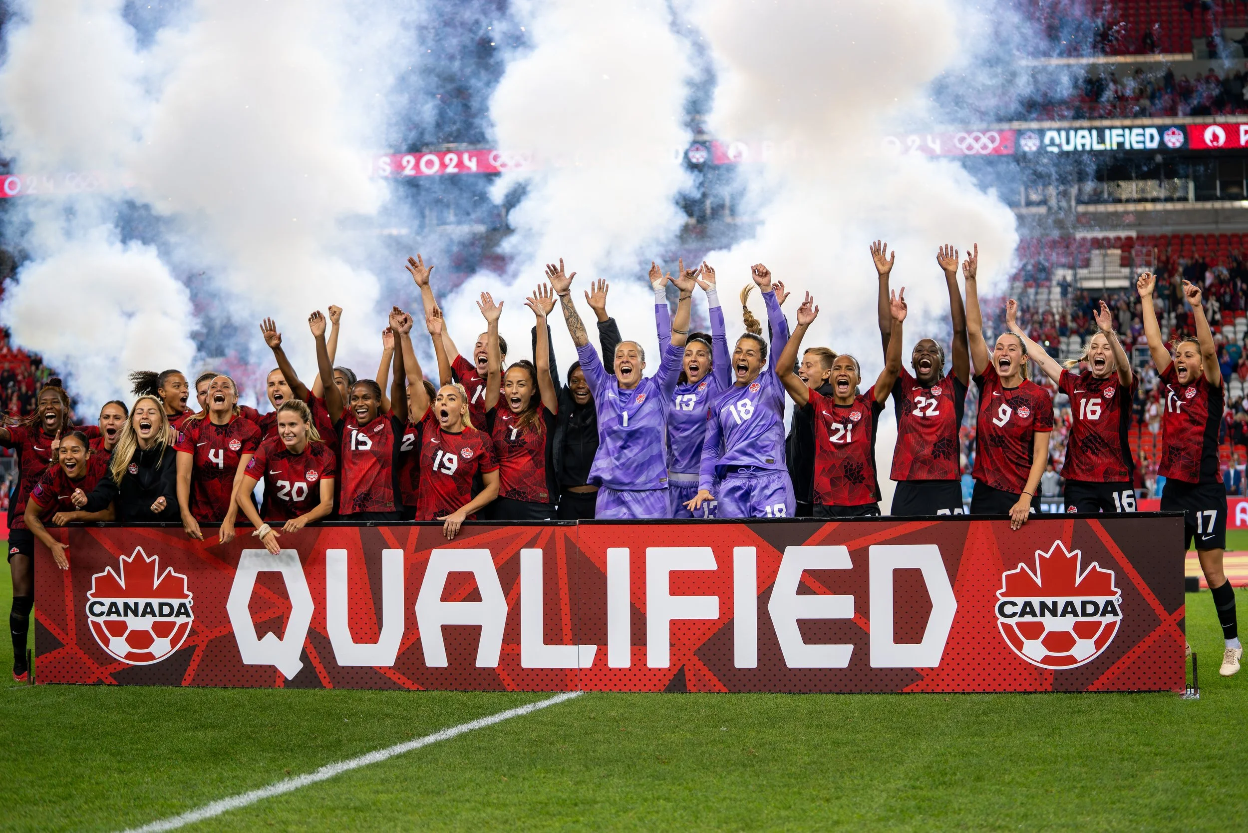 Canada celebrates qualifying for the 2024 Paris Olympic Games following a 2-1 victory over Jamaica in the Concacaf W Championship. September 26, 2023. (Kaj Larsen Photo for the Canadian Premier League)