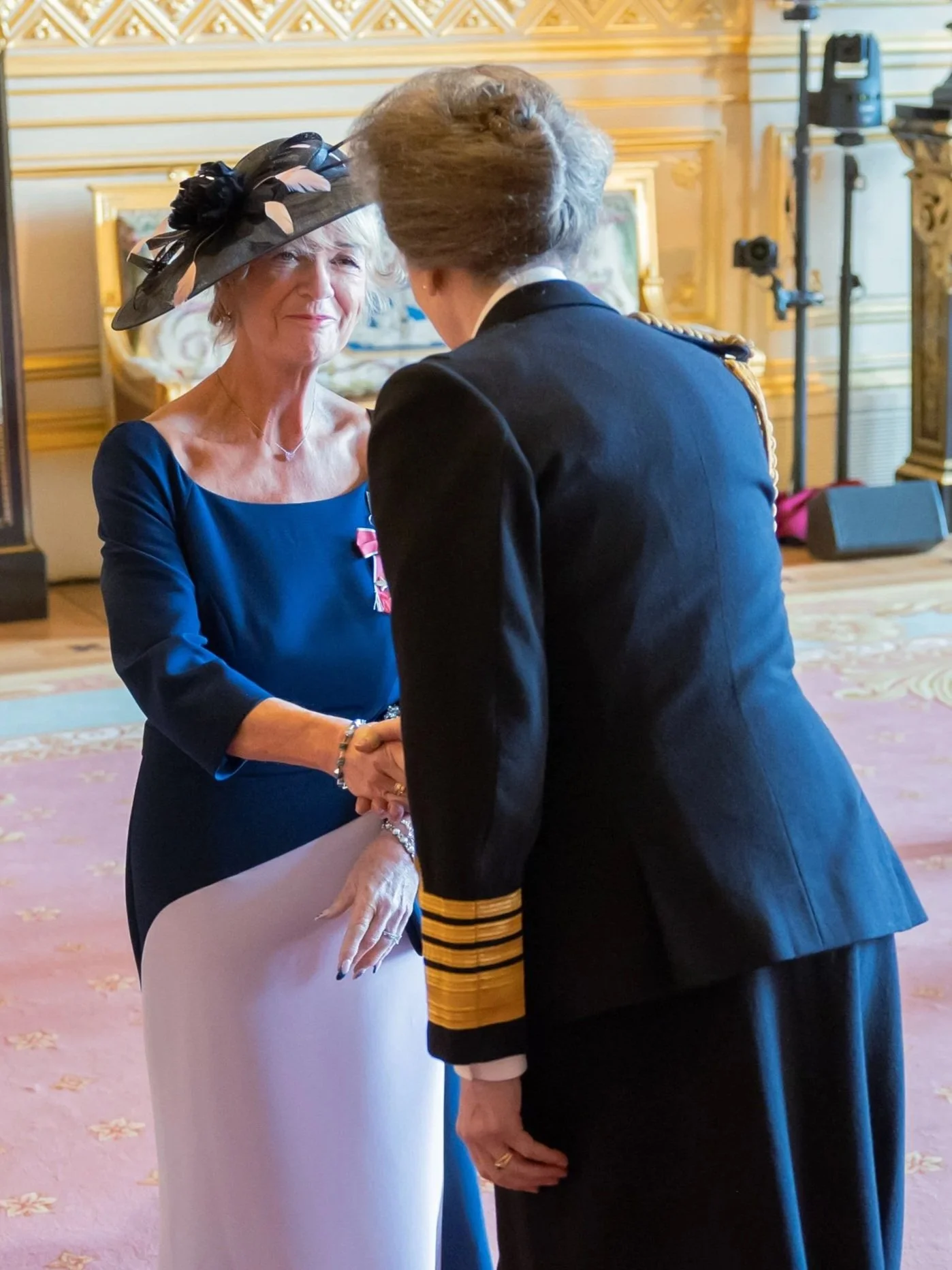 Jane receiving her MBE from HRH Princess Royal