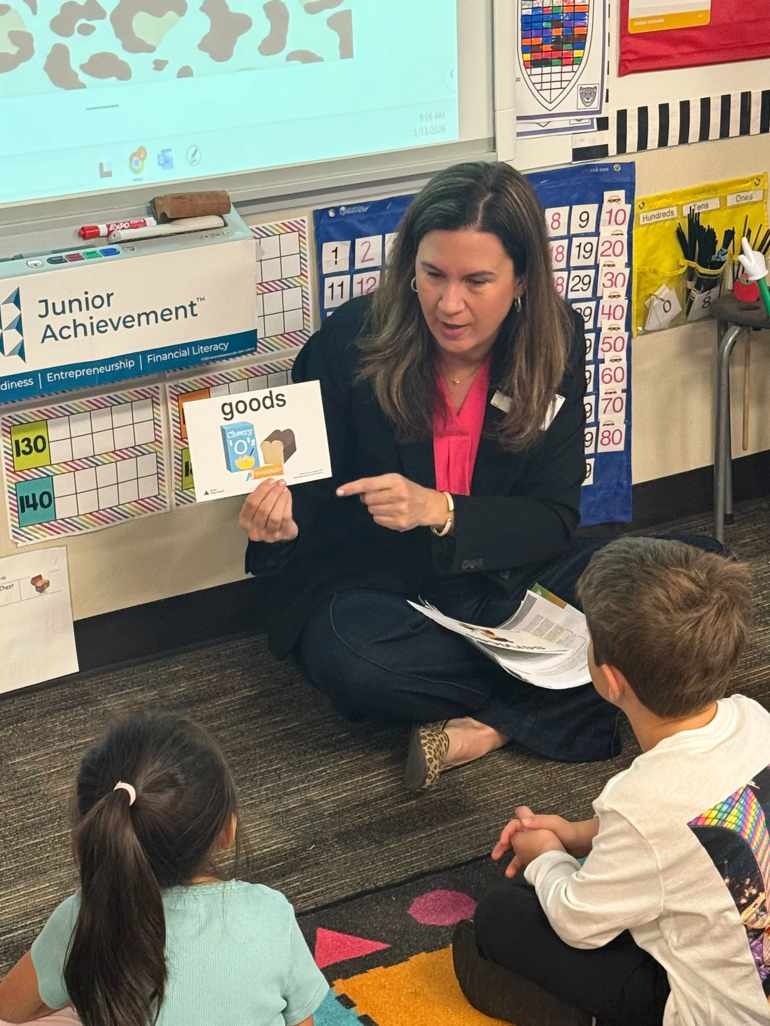 Katy Photographer, Maureen O'Shay, participates in the Junior Achievement Program at Jenks Elementary School.