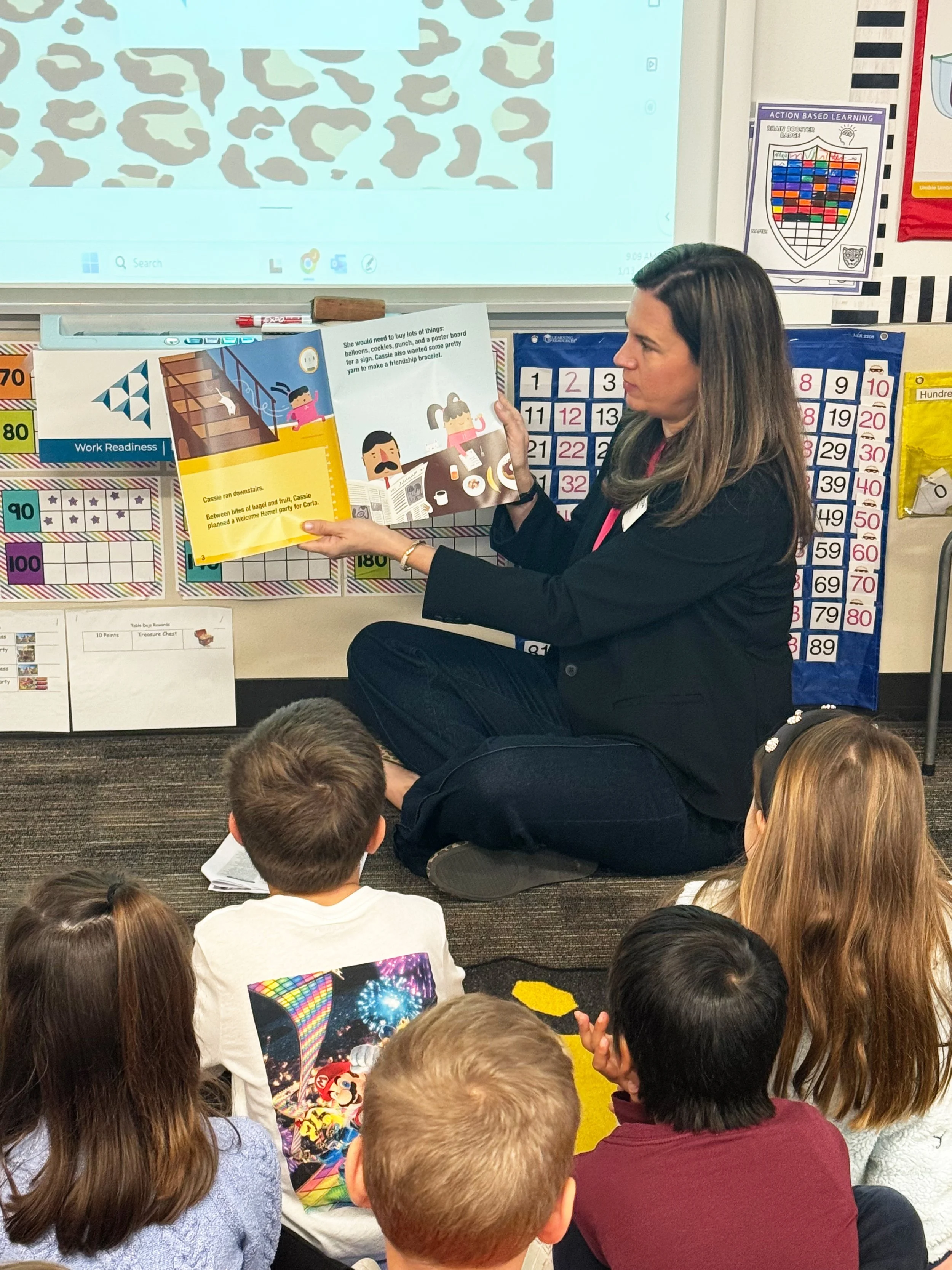 Katy Photographer, Maureen O'Shay, participates in the Junior Achievement Program at Jenks Elementary School.